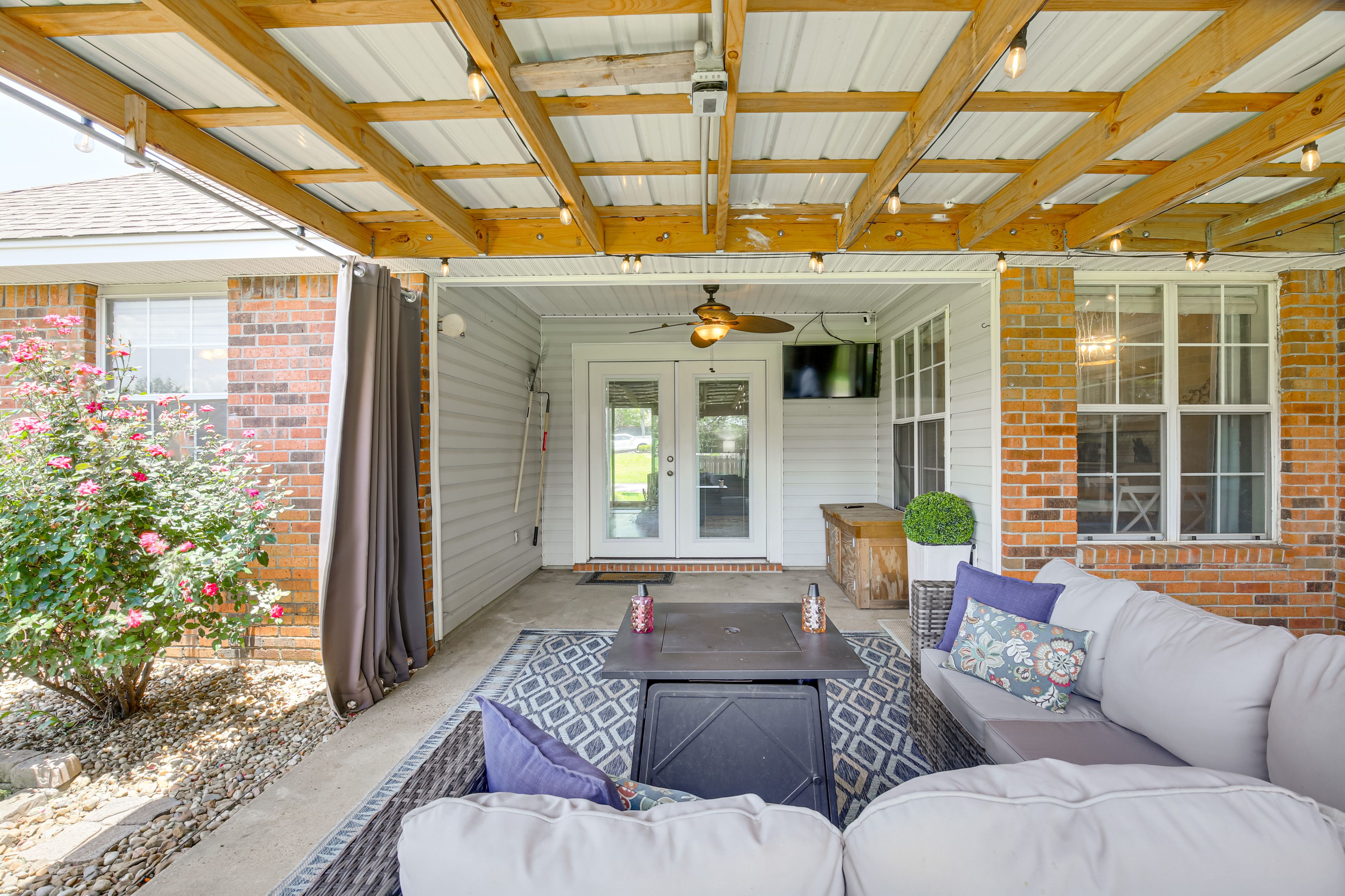 House Exterior | Covered Patio w/ Seating | TV