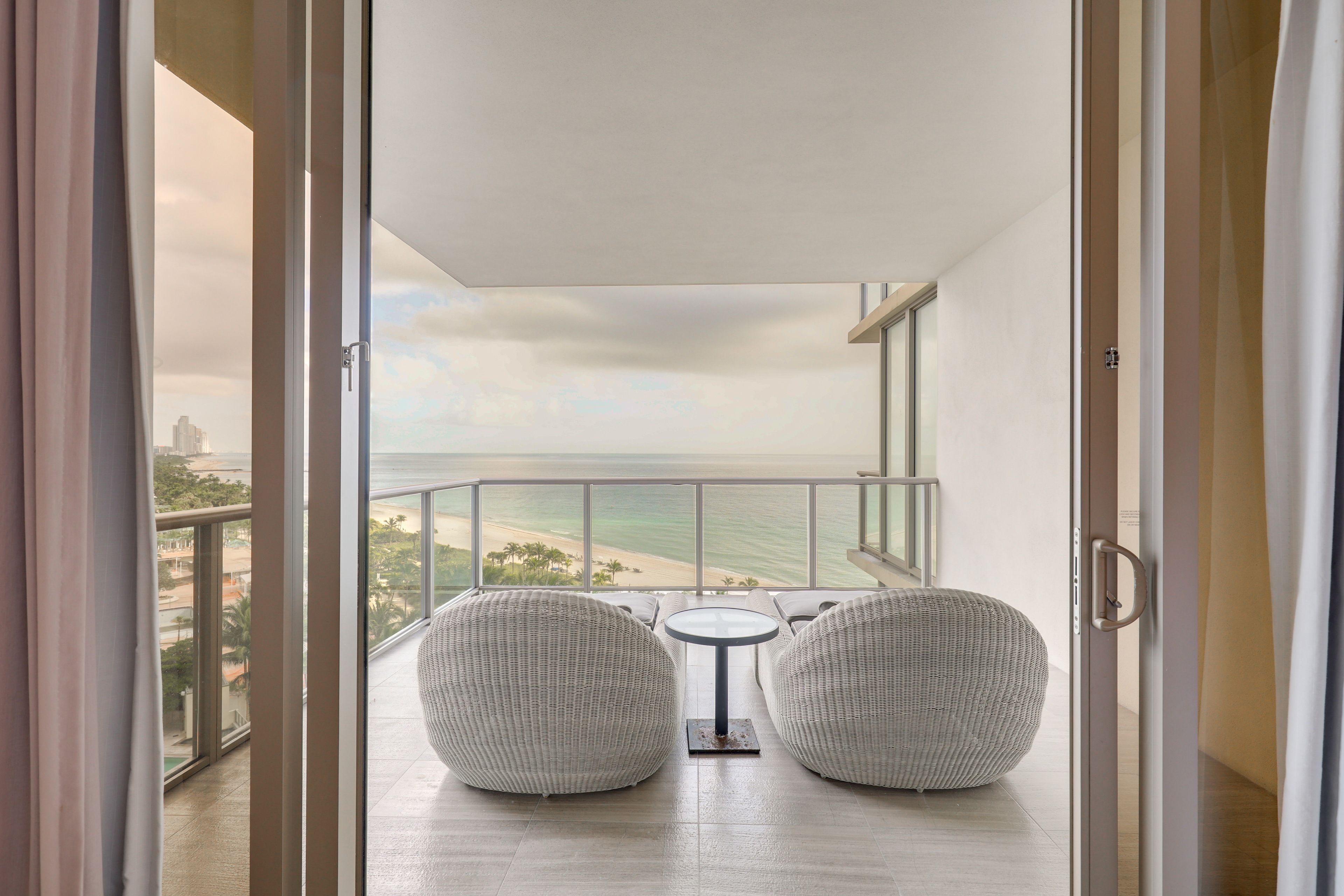 Condo Exterior | 2 Balconies w/ Seating | Pool, Beach & Ocean Views