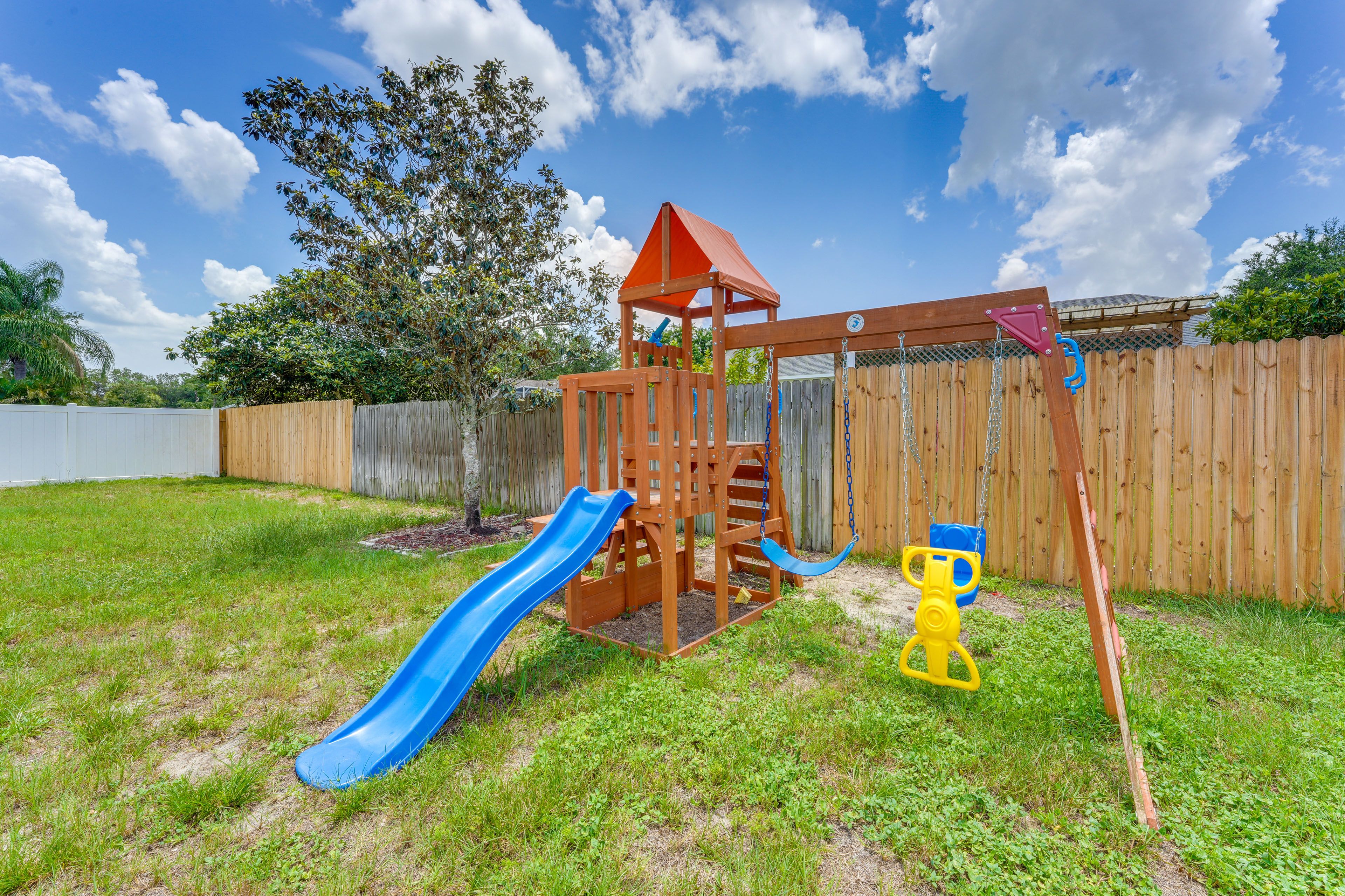 Exterior | Fenced Backyard | Play Area | Fire Pit (Wood Not Provided)