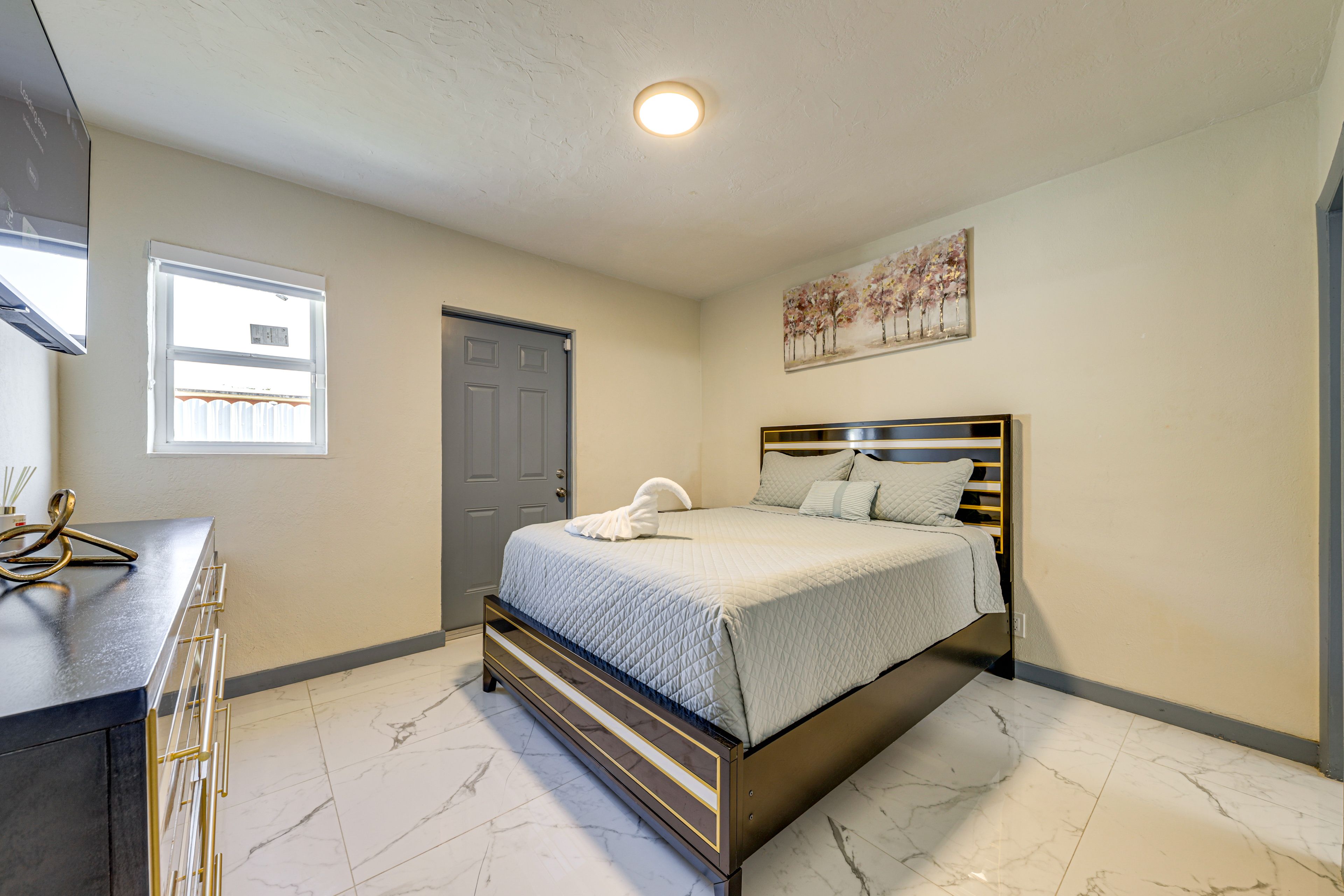 Bedroom 1 | Queen Bed | 40” Smart TV | Linens Provided