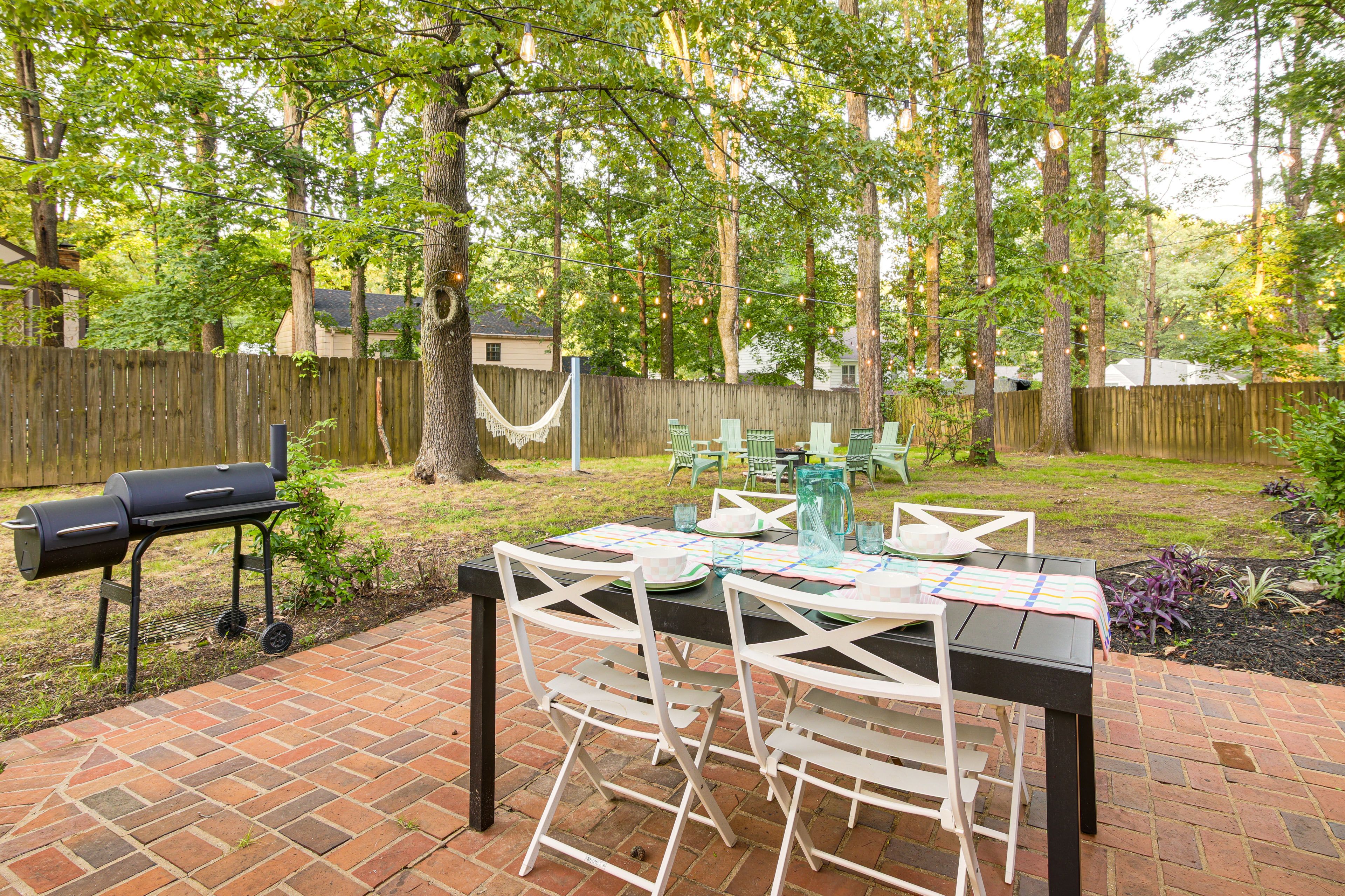 Fenced-In Yard | Outdoor Dining Space | Charcoal Grill | Cornhole