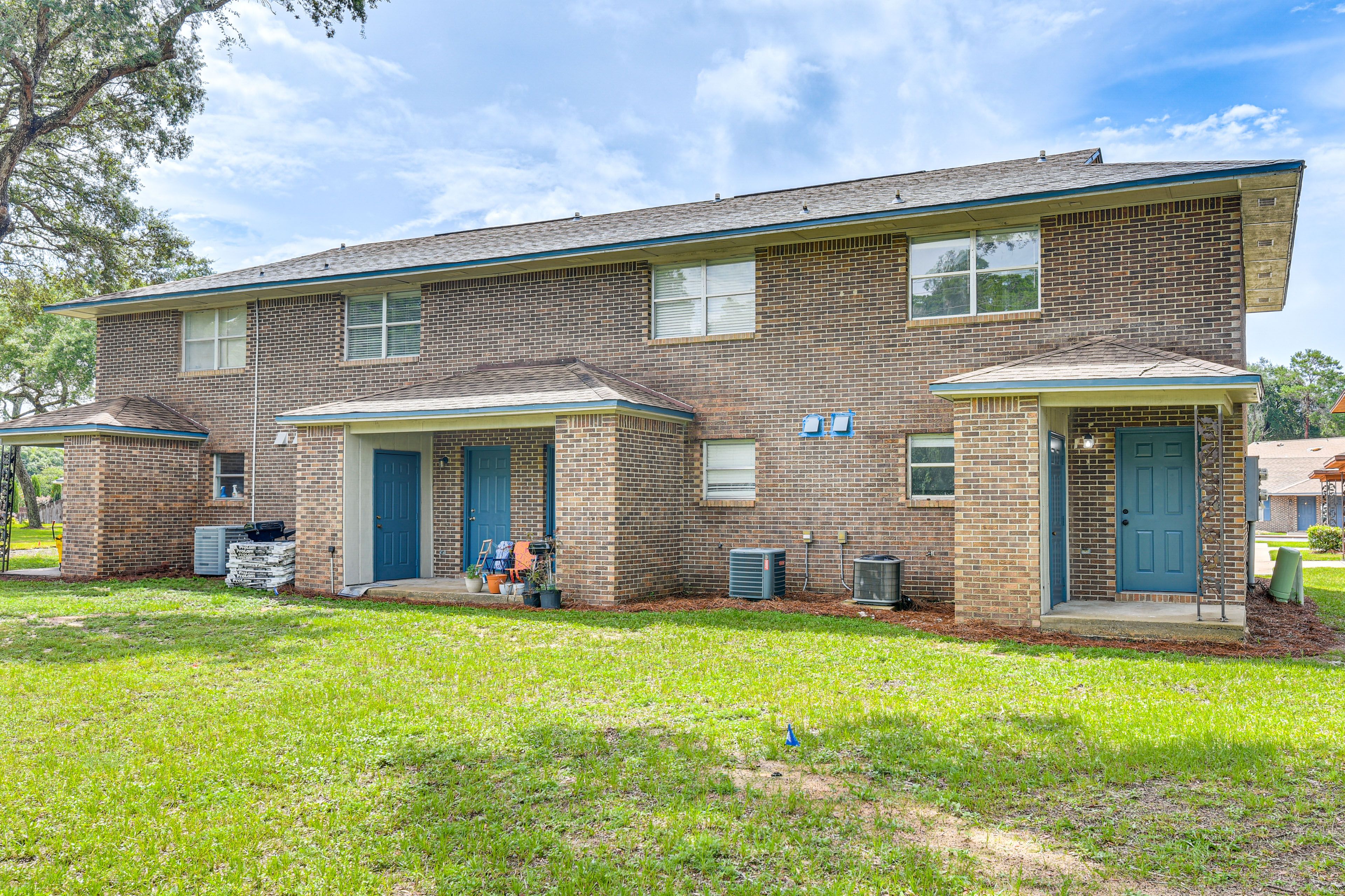 Property Exterior | Communal Yard & Pet Stations