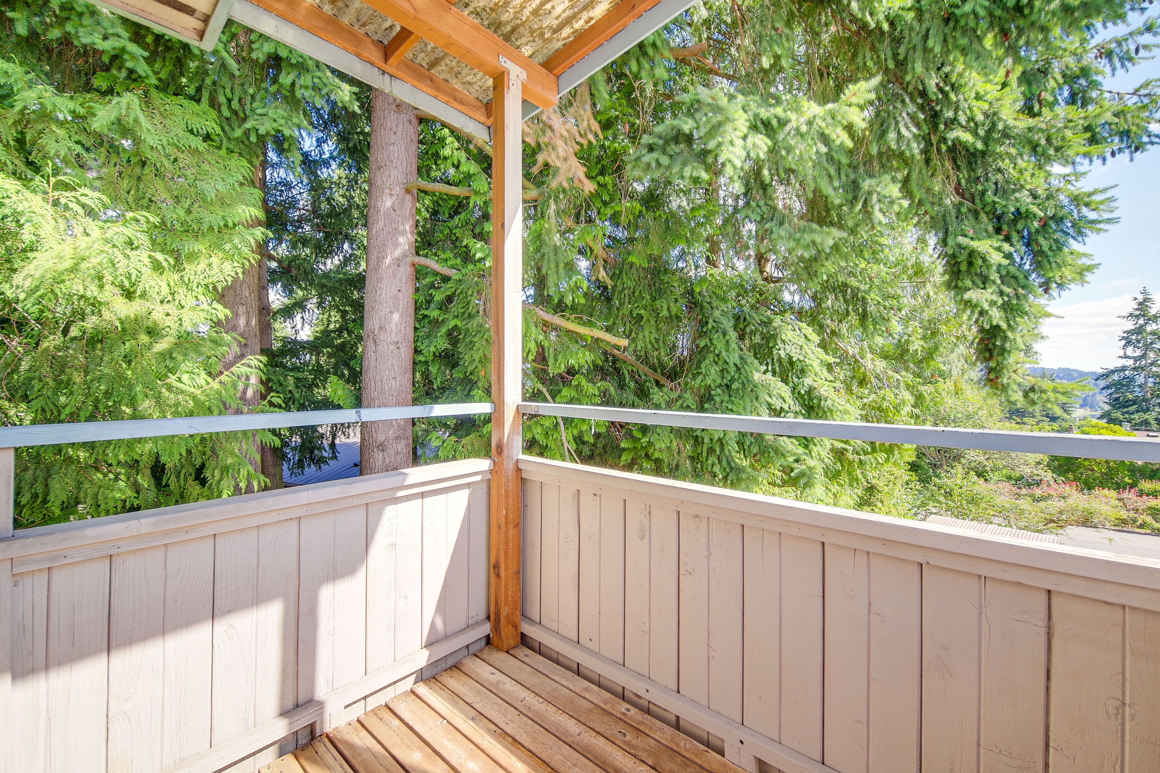 Apartment Exterior | Covered Balcony w/ Seating