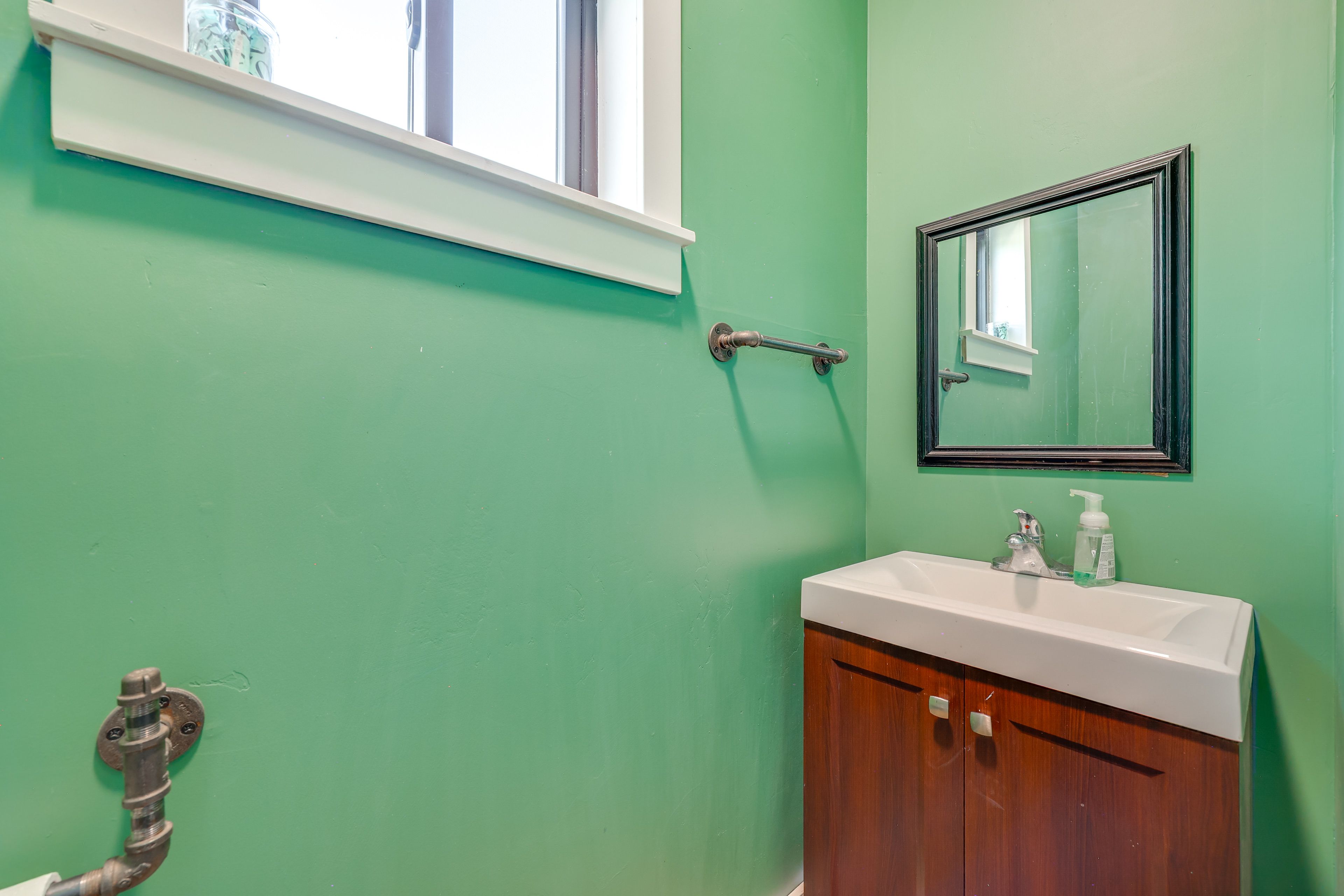 Half Bathroom | Access via Garage