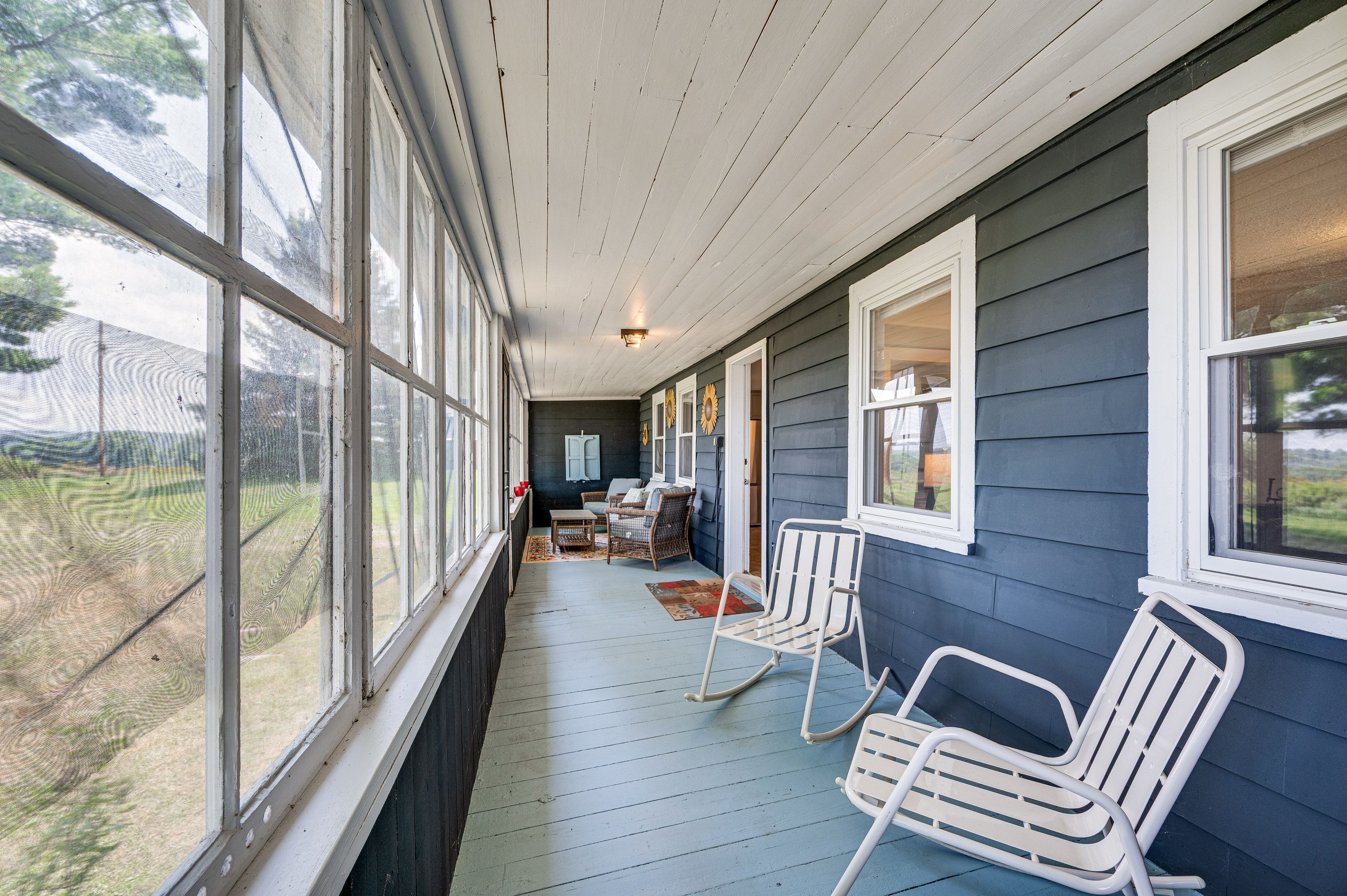 Cabin Exterior | Screened Porch w/ Seating