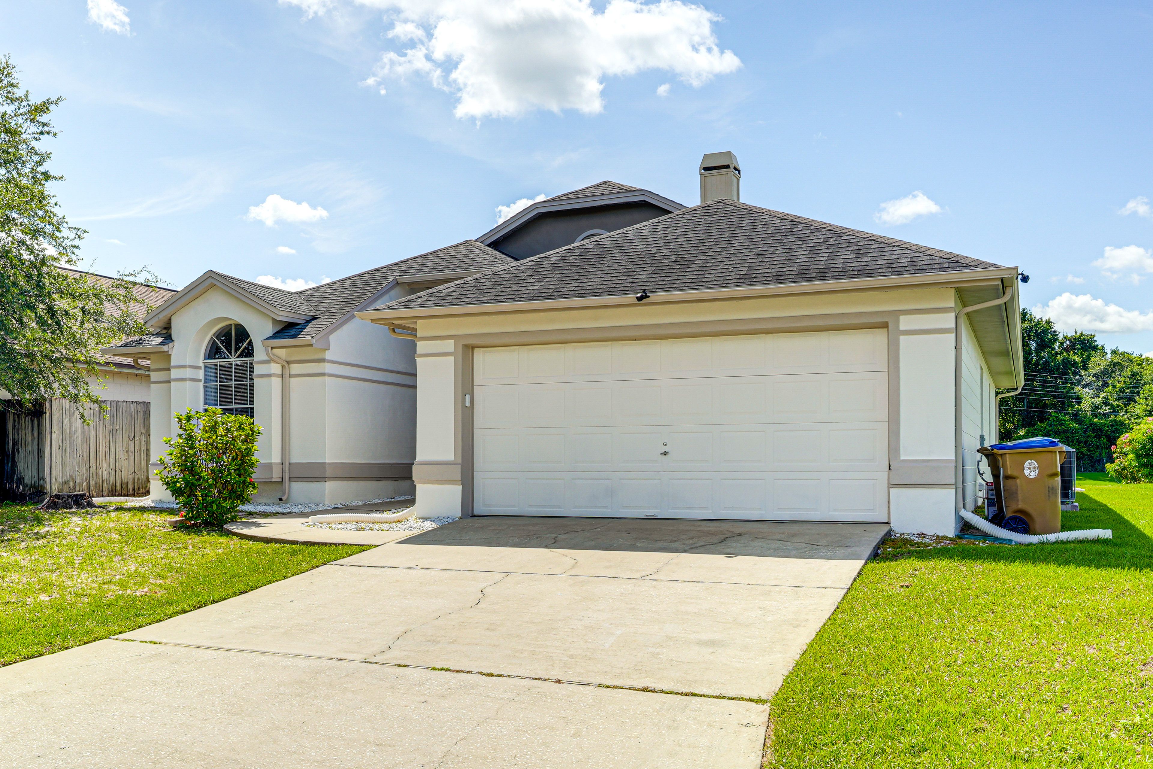 Home Exterior | Parking | Garage (2 Vehicles) | Driveway (4 Vehicles)