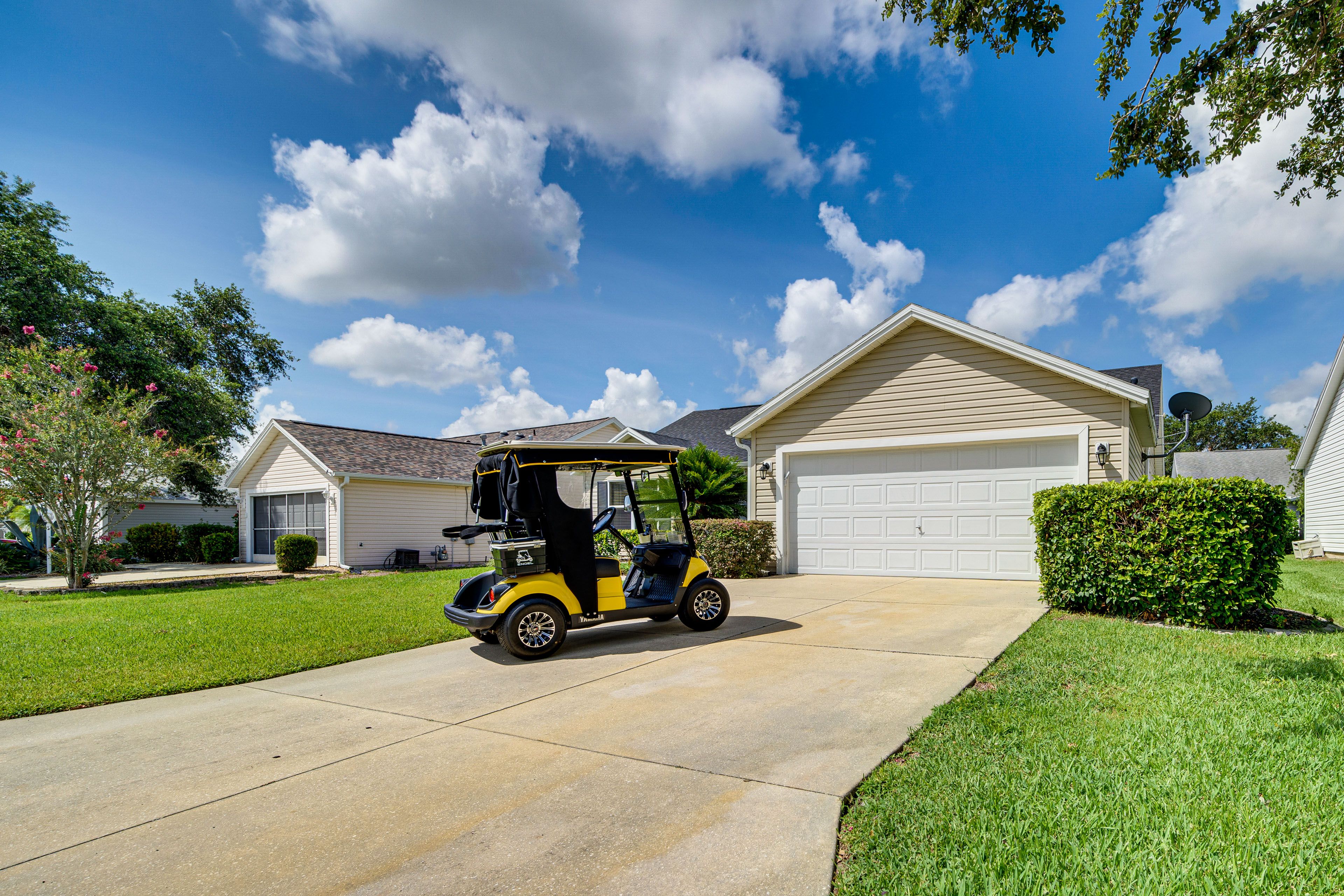 Parking | Driveway (2 Vehicles) | Garage (1 Vehicle & 1 Golf Cart)