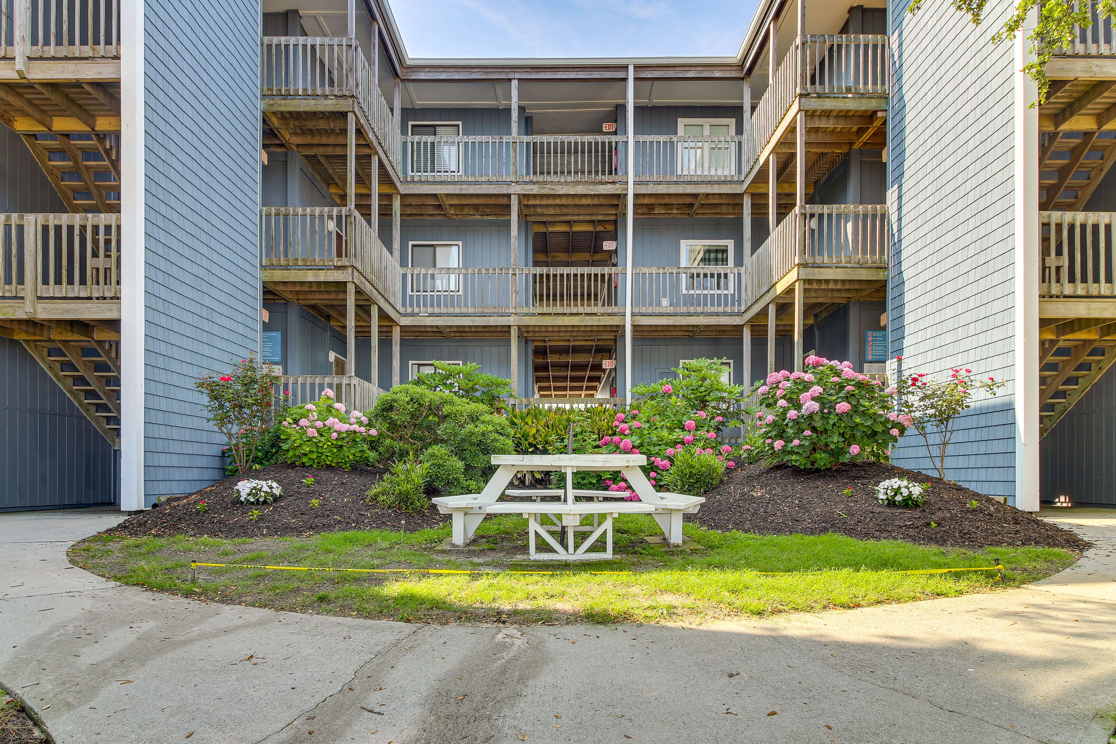 Condo Exterior | Parking | Designated Spots (2 Vehicles)