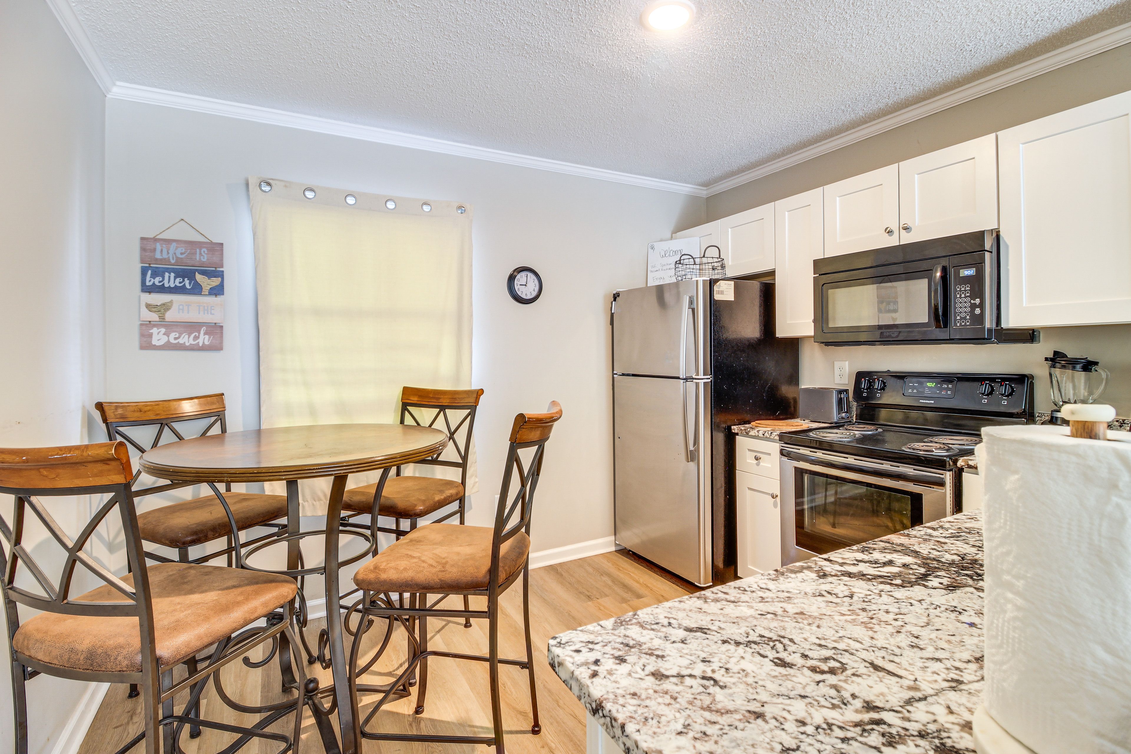 Kitchen & Dining Area | Central A/C & Heating