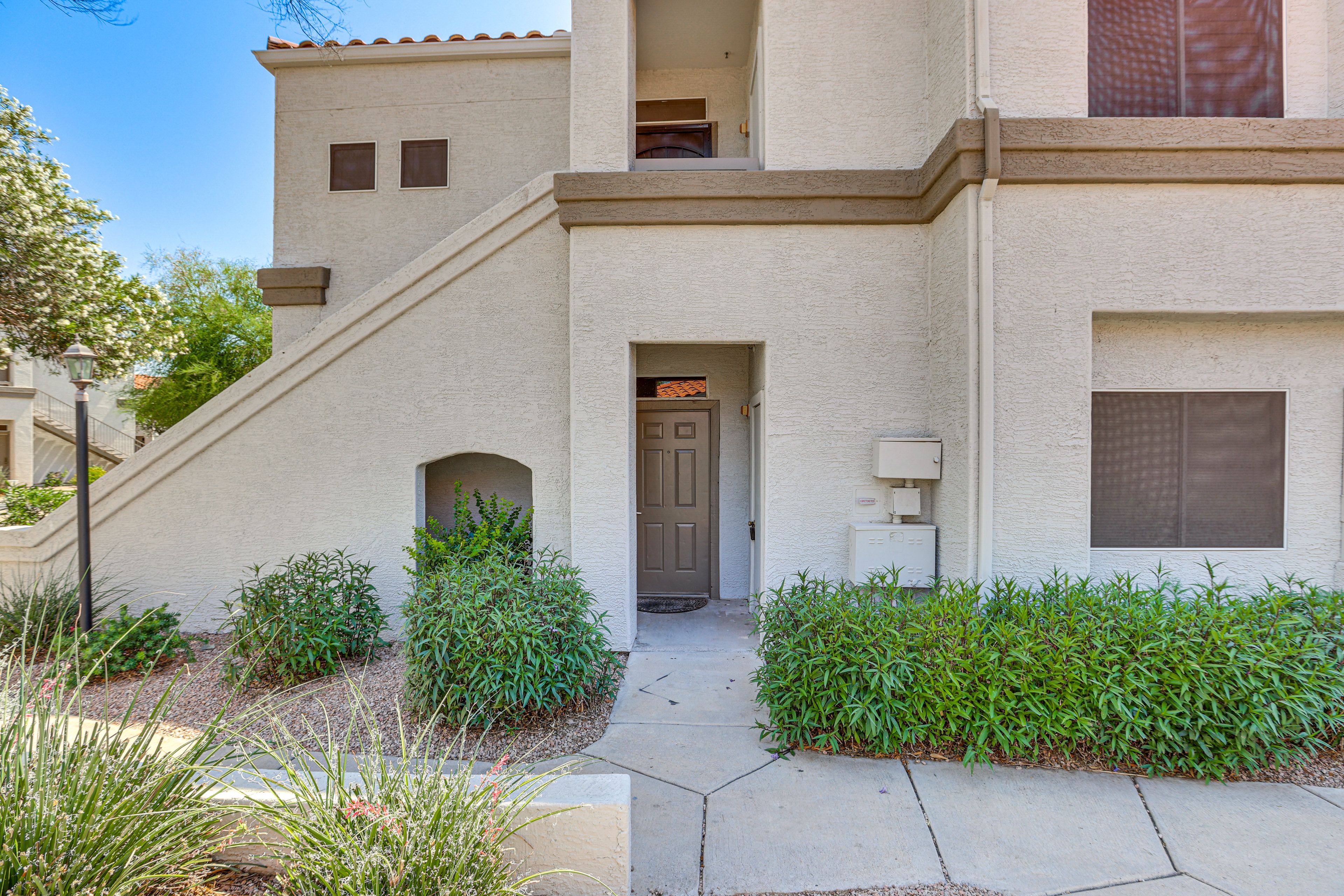 Condo Exterior | Parking | Designated Covered Spot (1 Vehicle) | Guest Parking