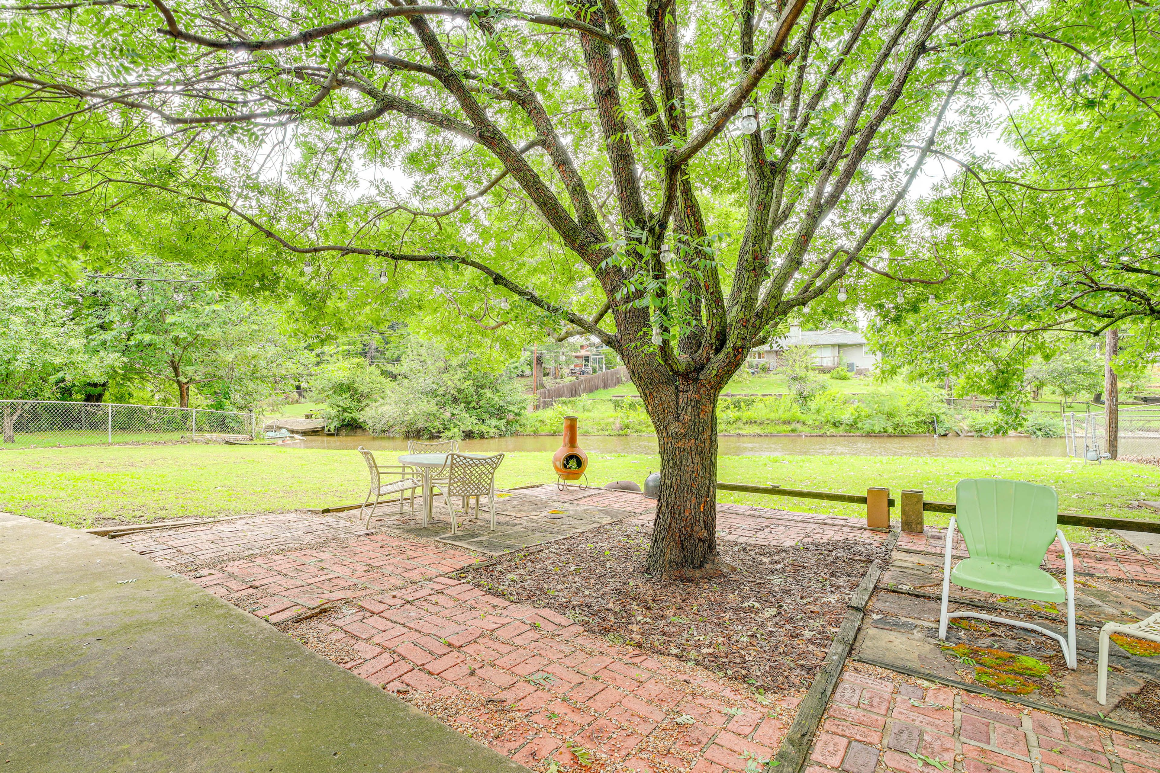 Back Patio | Spacious Yard | Water Views