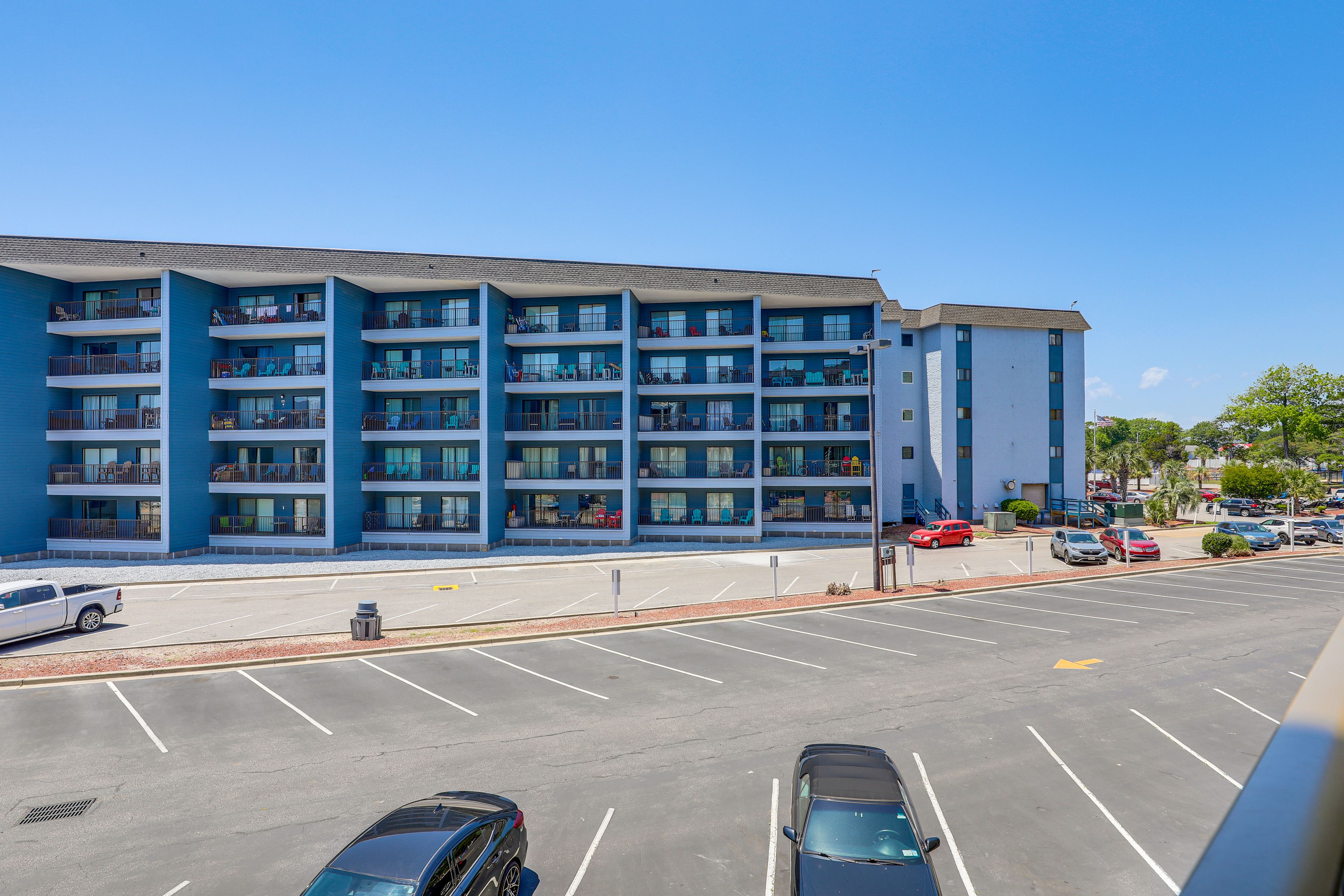 Exterior | Parking | Community Lot (2 Vehicles, First-Come, First-Served Basis)