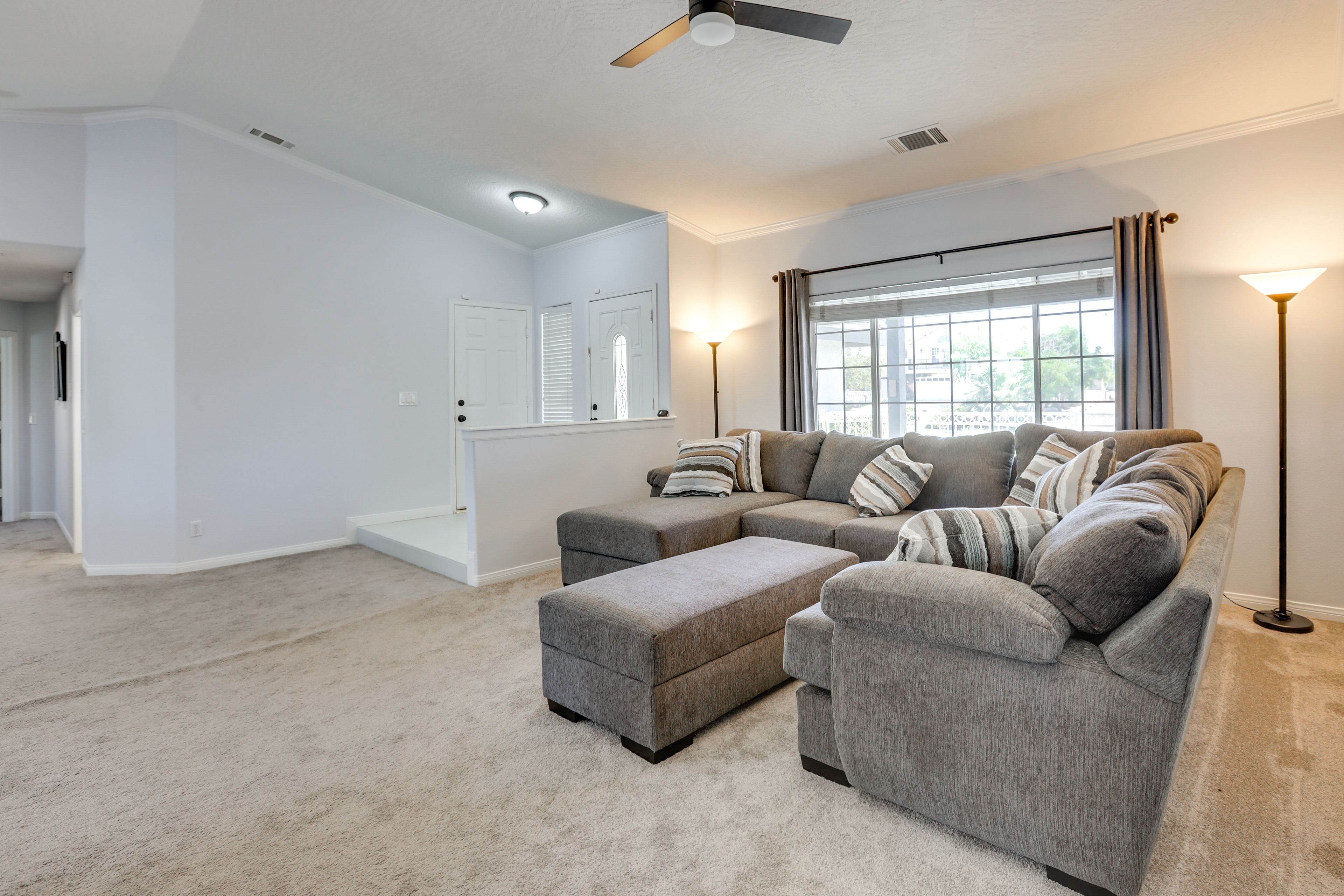 Family Room | 1 Interior Step | Central A/C & Heating | Smart TV