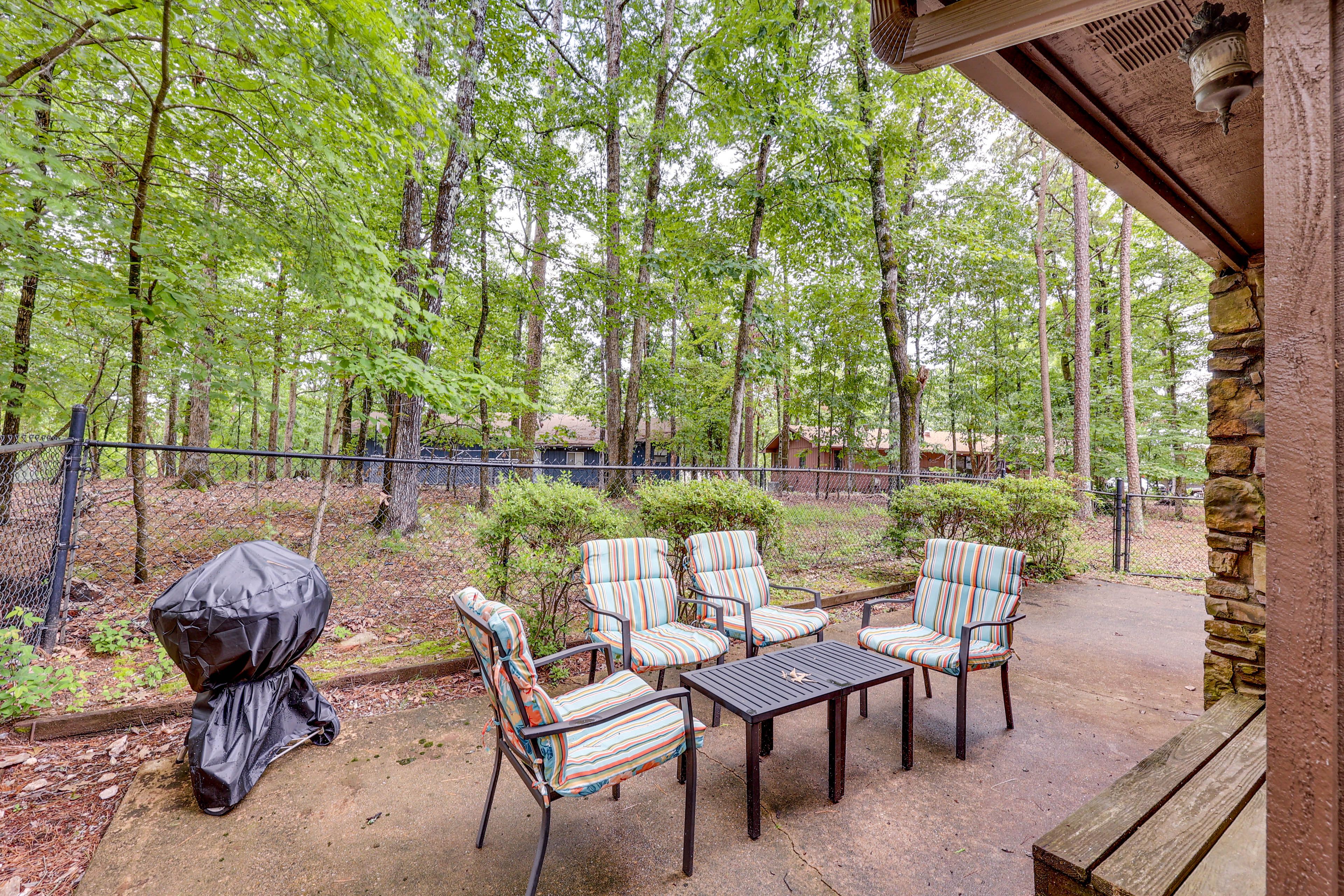 Fenced-In Patio | Dining Area | Charcoal Grill