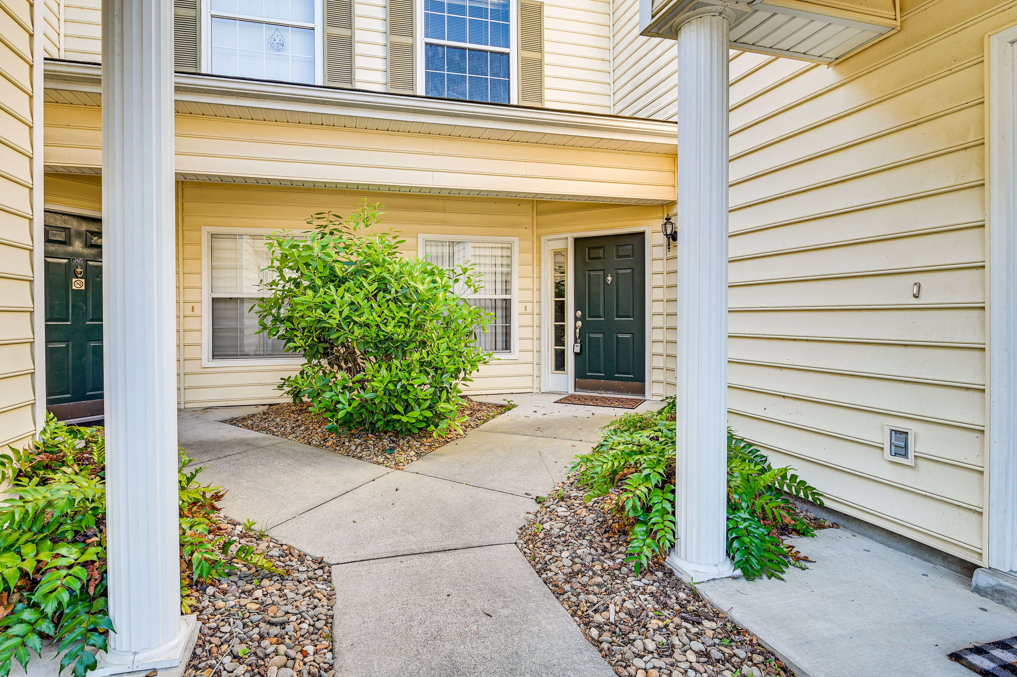 Condo Exterior | Parking | Open Community Lot (2 Vehicles)