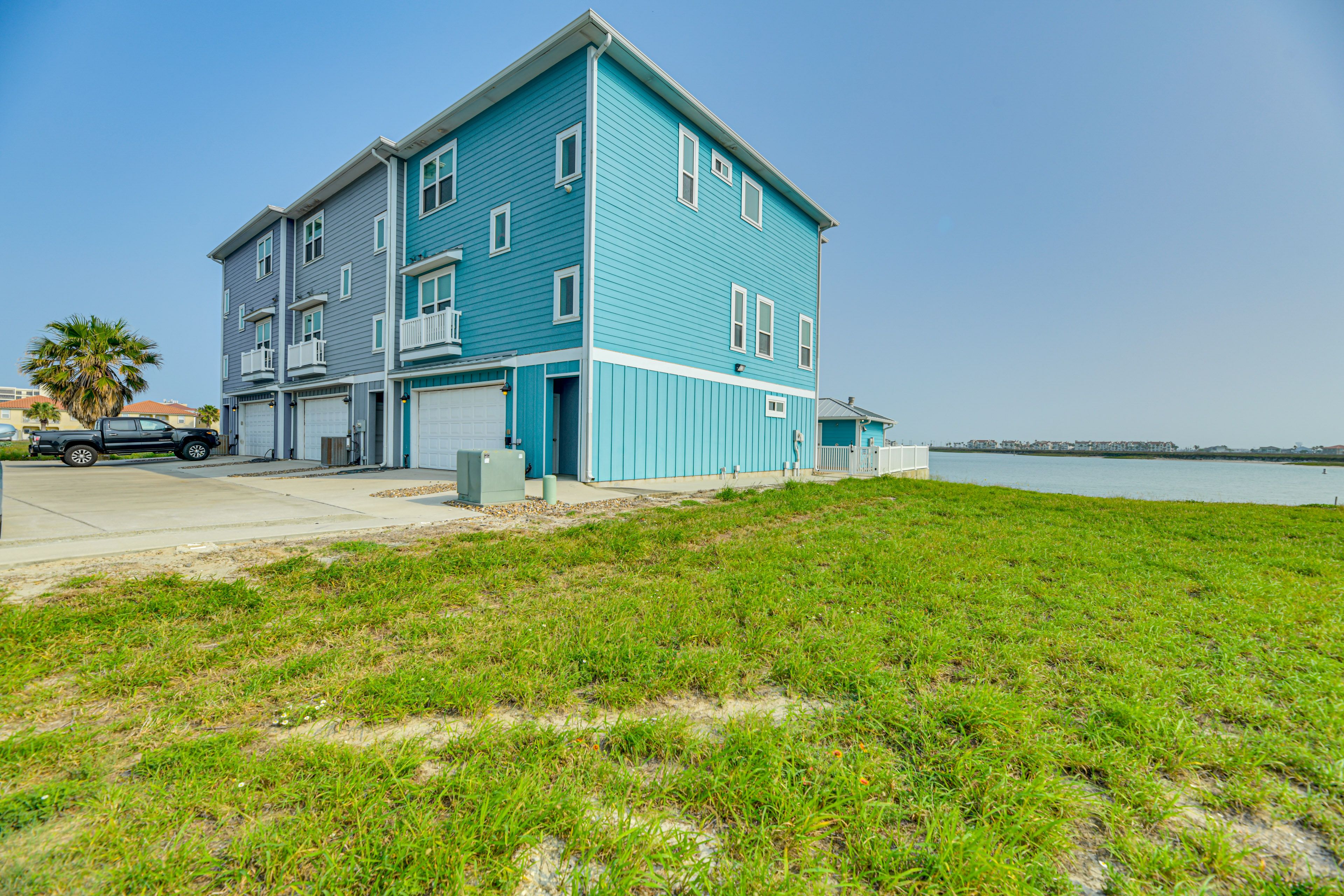 Townhome Exterior | Boat Trailer Parking Allowed On-Site