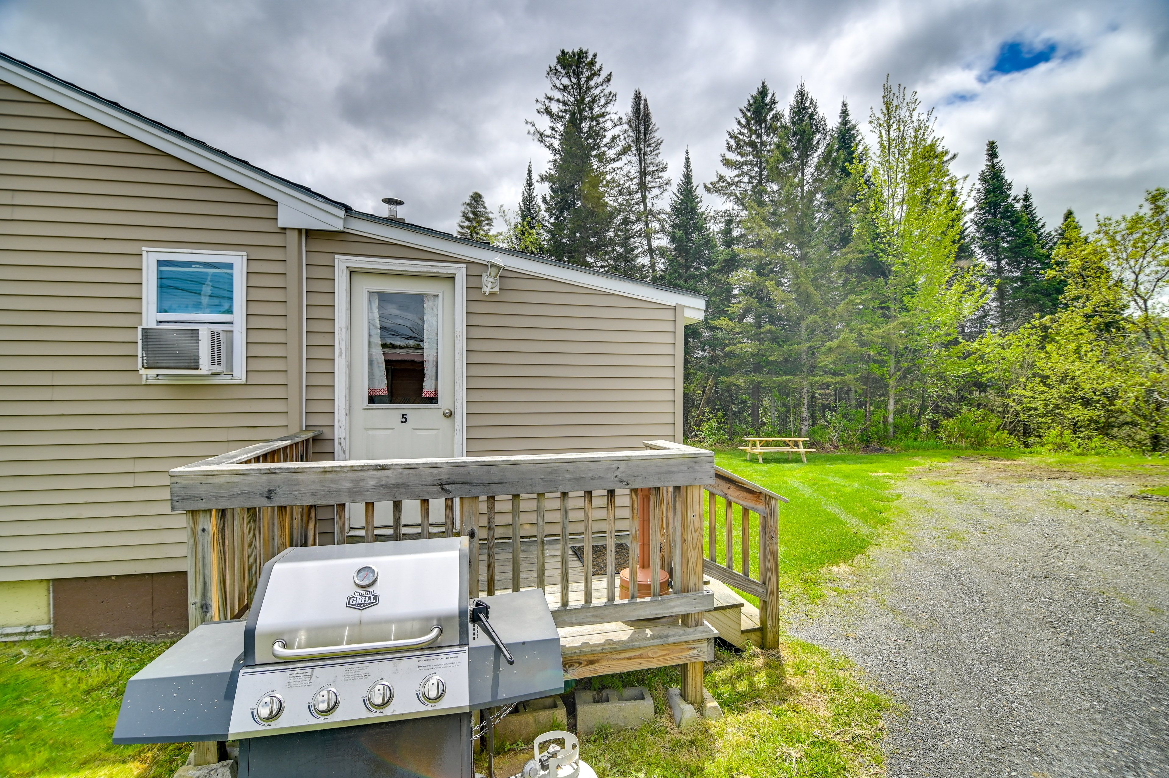 Property Exterior | Private Gas Grill | Community Parking Lot (2 Vehicles)
