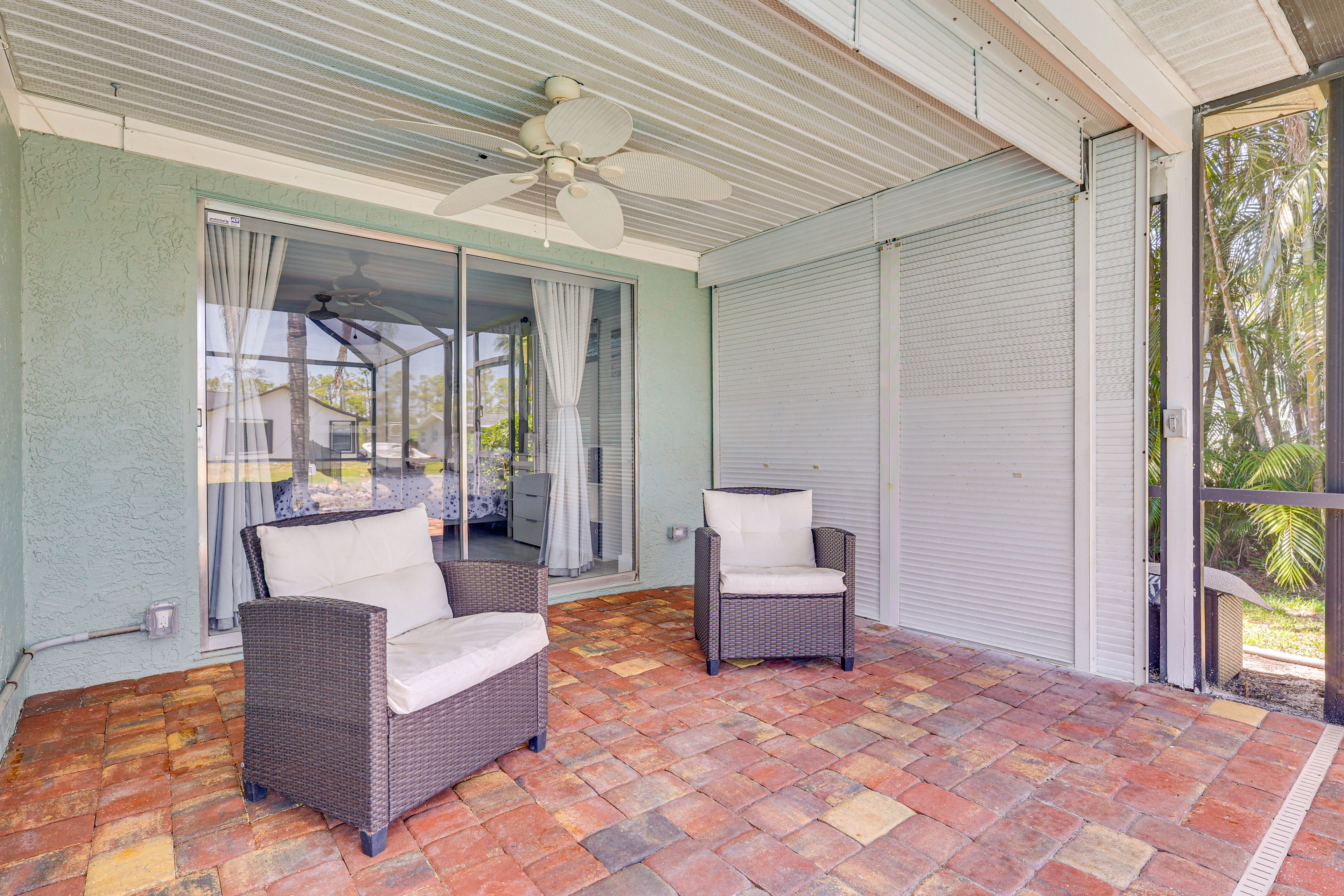 Screened-In Lanai | Seating | Water View