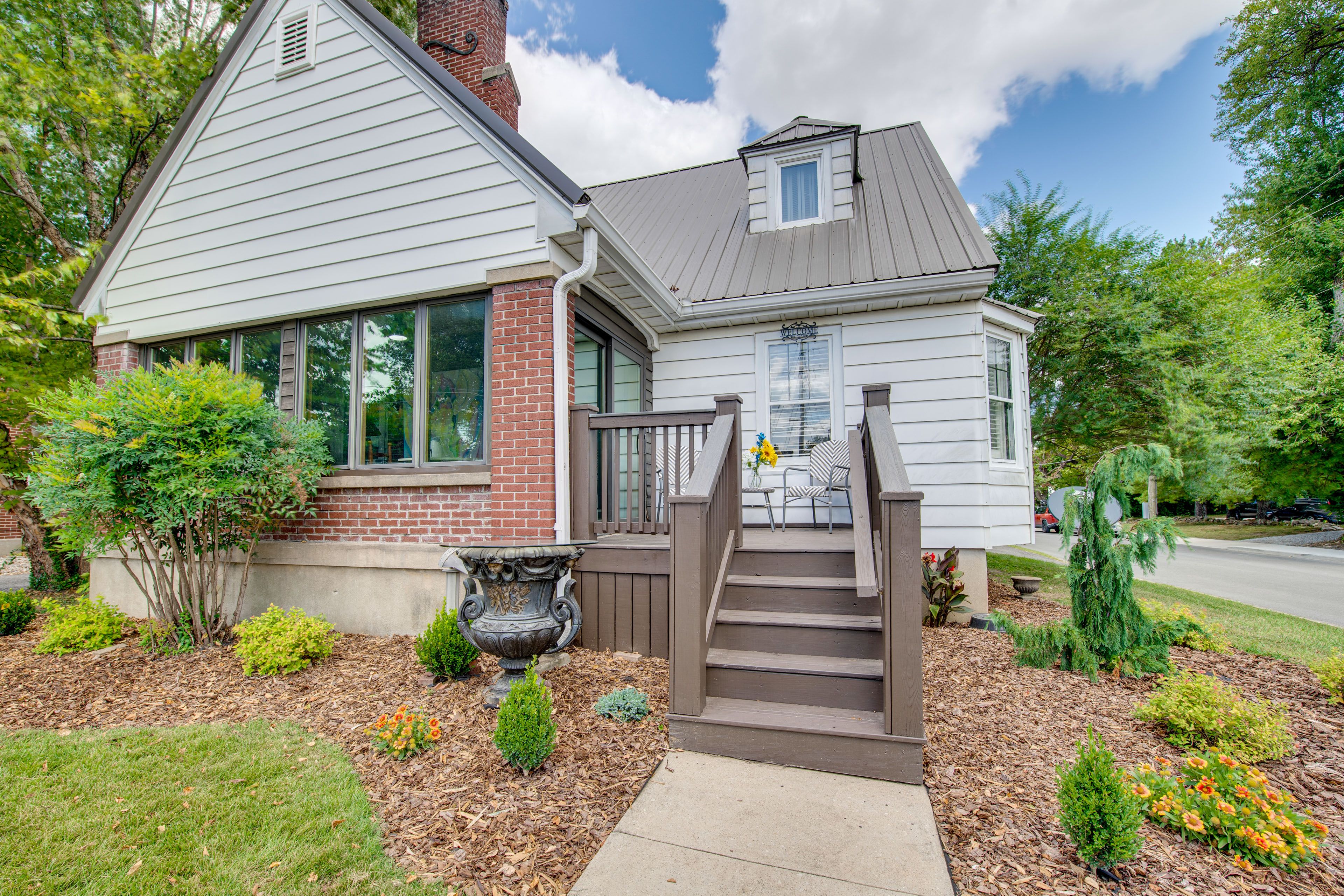 Exterior | Driveway (2 Vehicles) | Garage (2 Vehicles) | Grassy Lot (4 Vehicles)