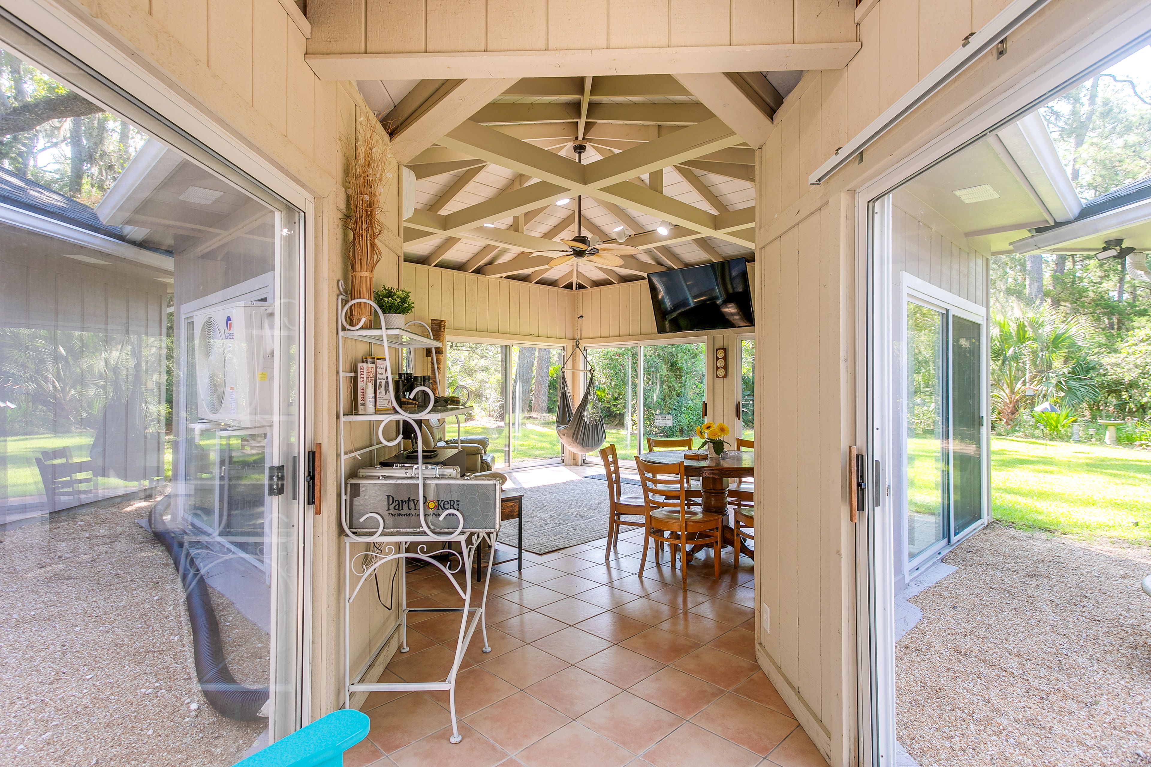 Sunroom | Hammock Chairs | Dining Table