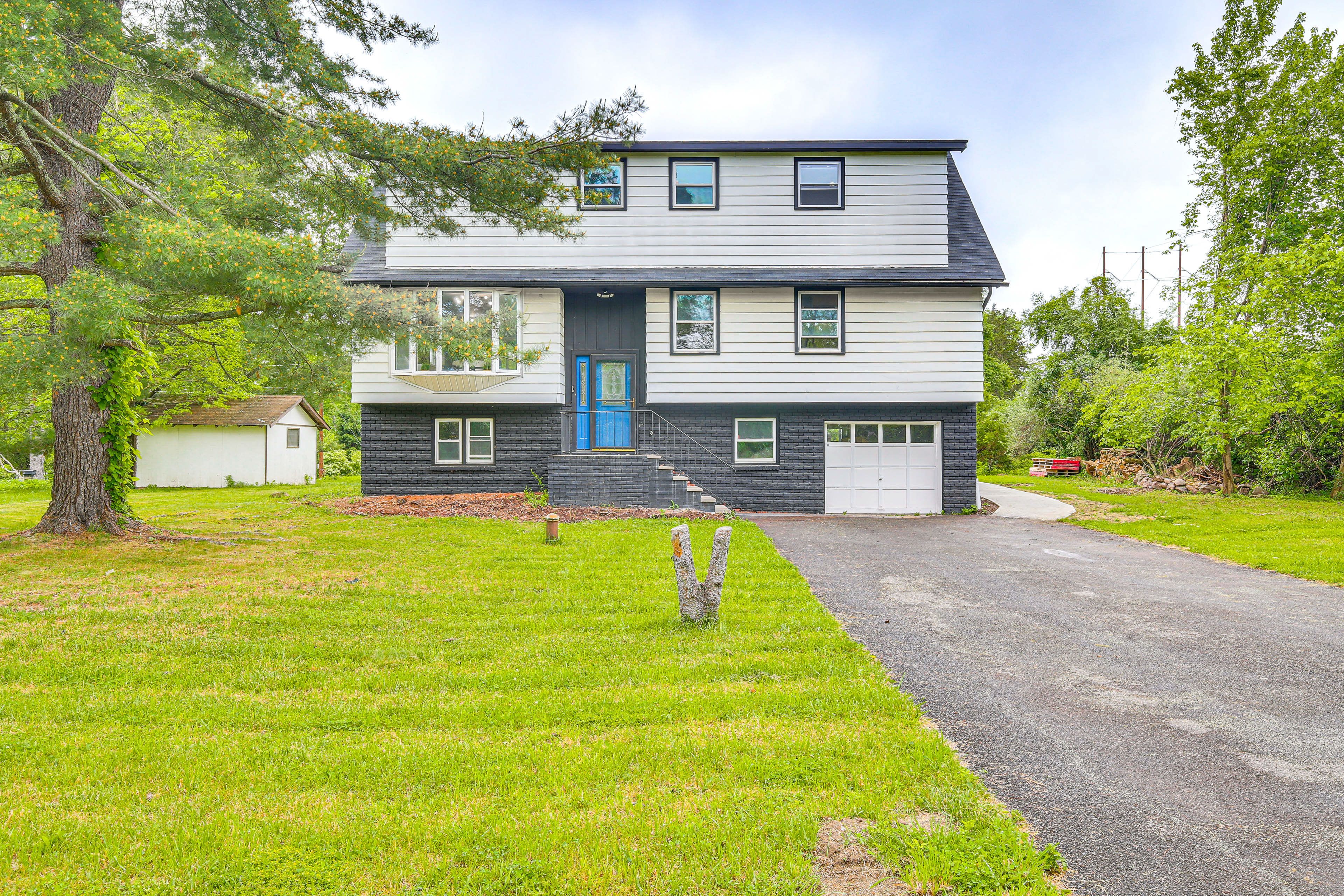 Exterior | Driveway (3 Vehicles) | Free Street Parking