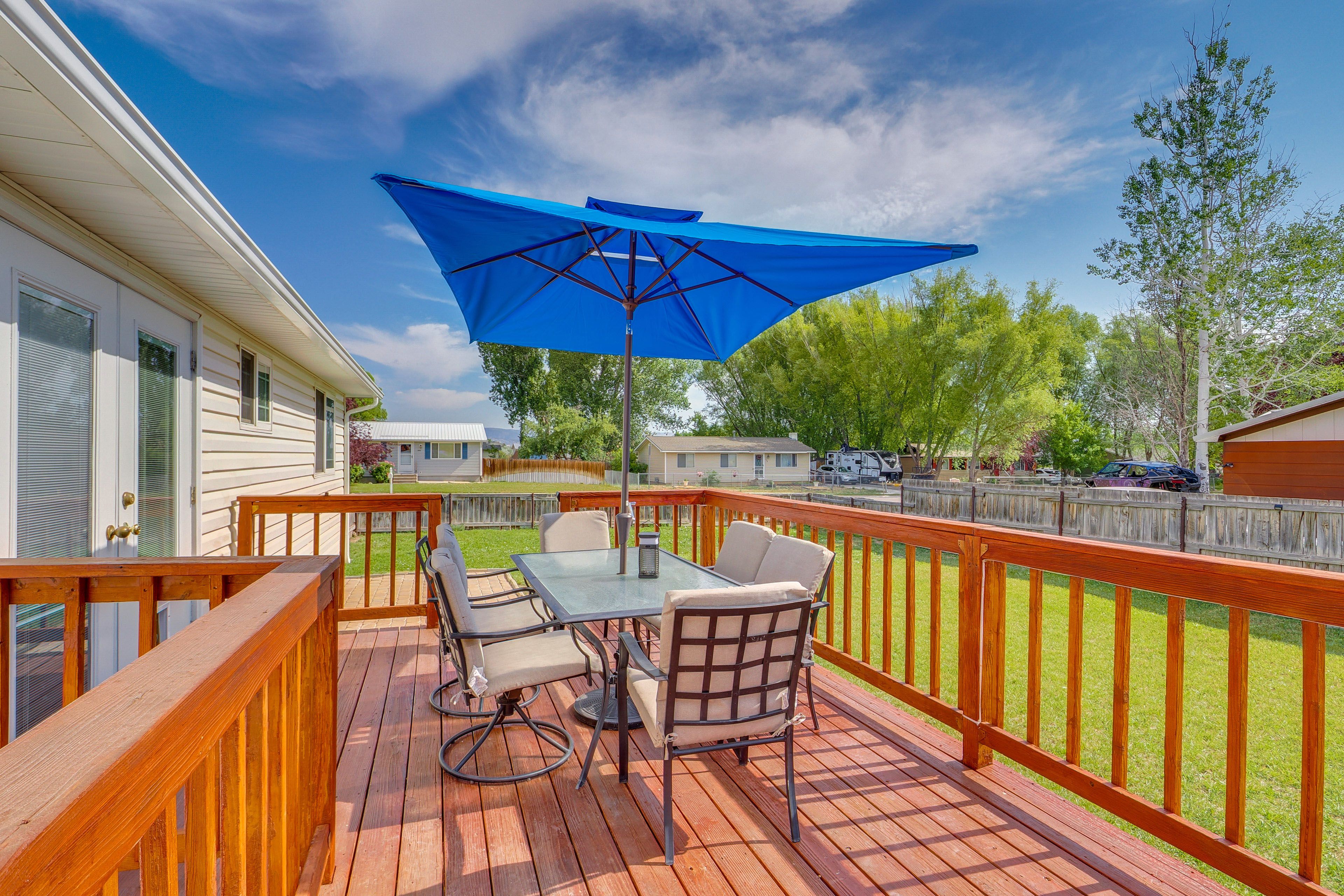 House Exterior | Deck | Dining Area | Fenced Backyard