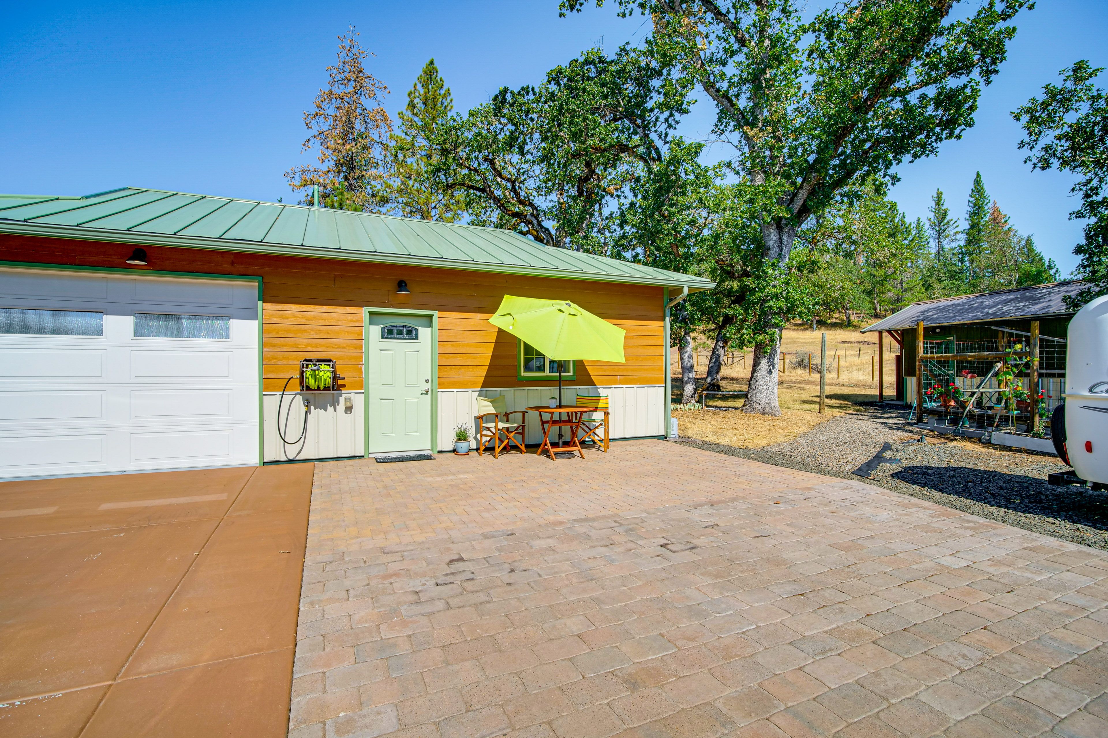 Exterior | Patio | Dining Area w/ Umbrella