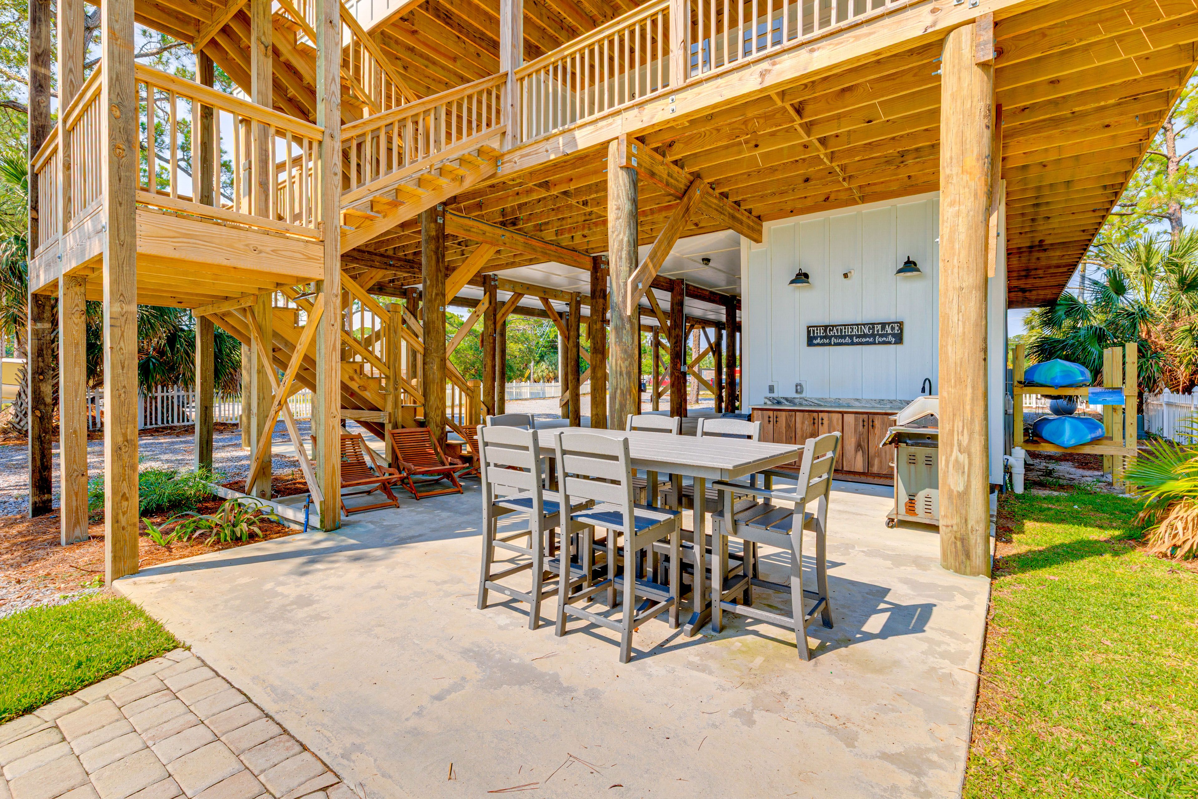 Condo Exterior | Community Boat Dock | Grill | Outdoor Dining Areas