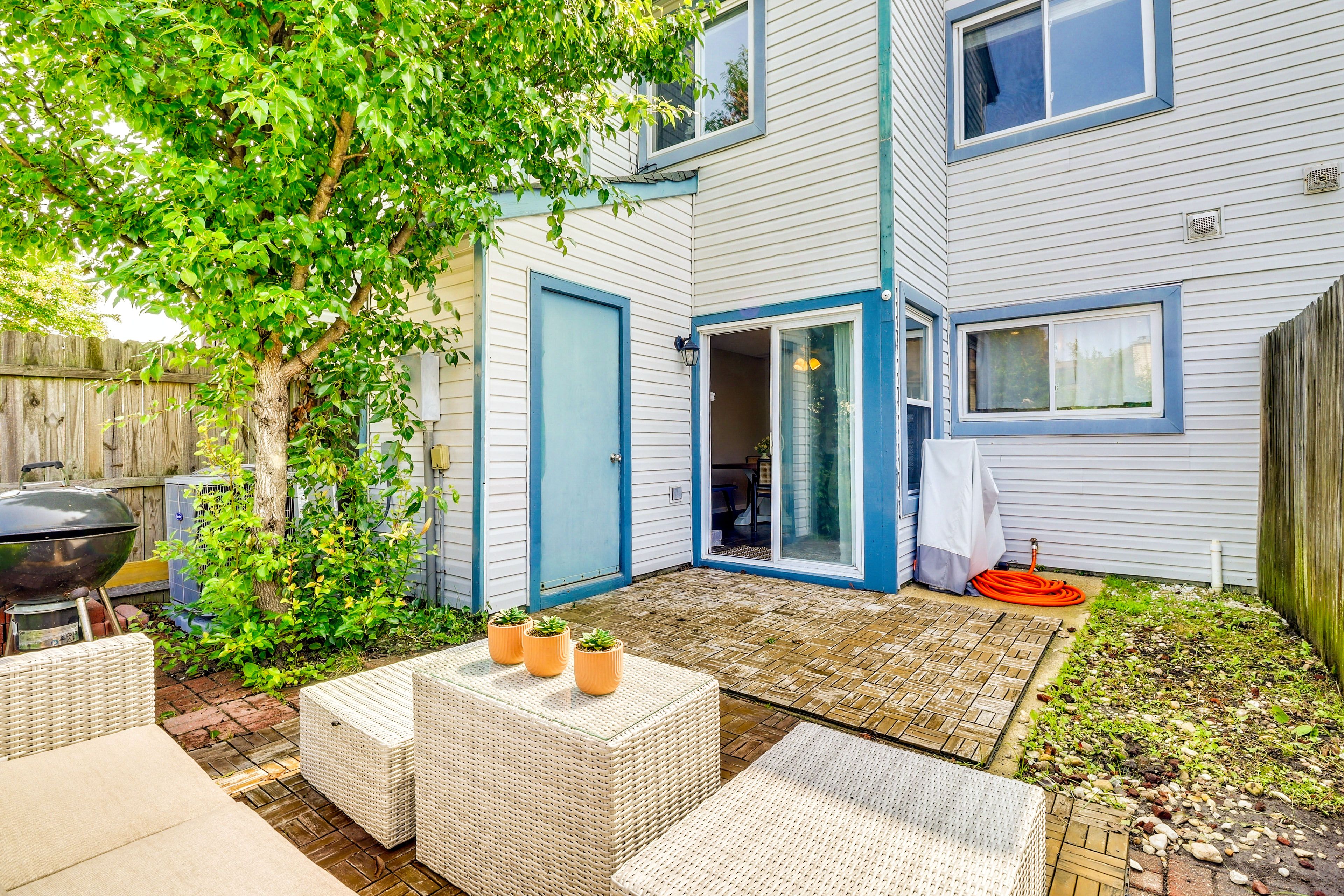 Patio | Charcoal Grill | Fenced Yard | 2-Story Townhome
