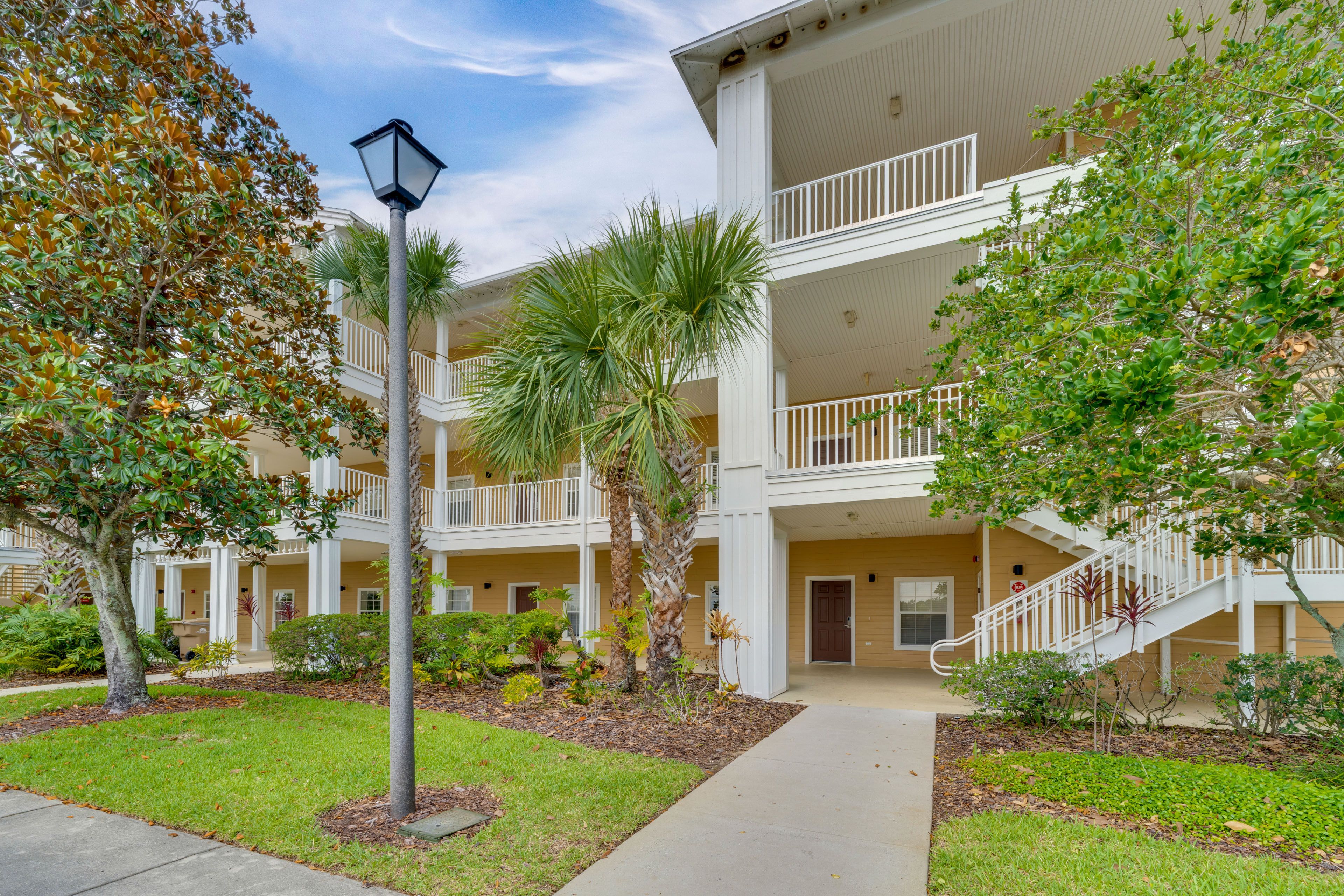 Building Exterior | Open Community Parking Lot (First-Come, First-Served)