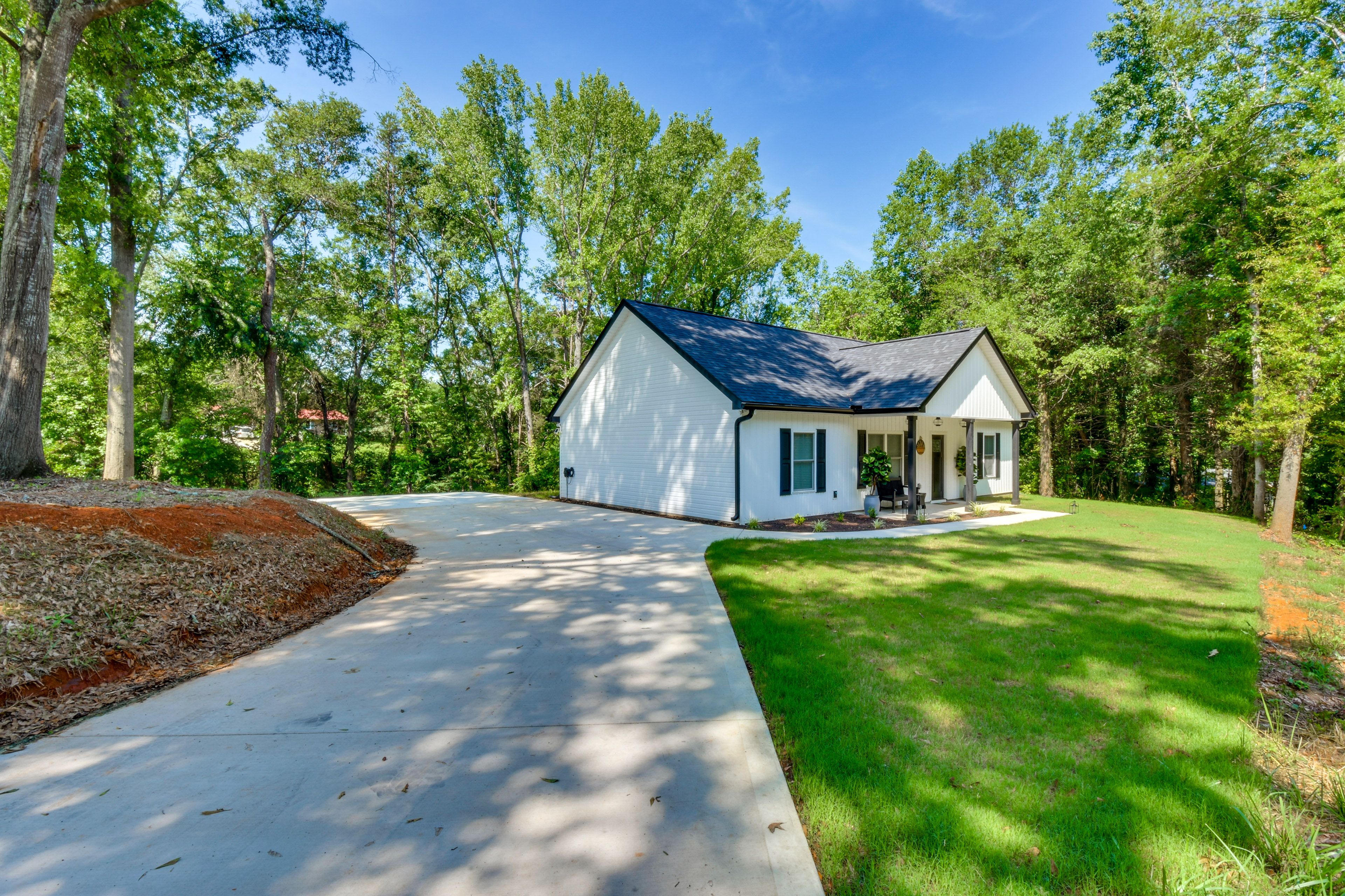 2 Driveways (5 Vehicles) | Boat/Trailer/RV Parking Available | EV Charger