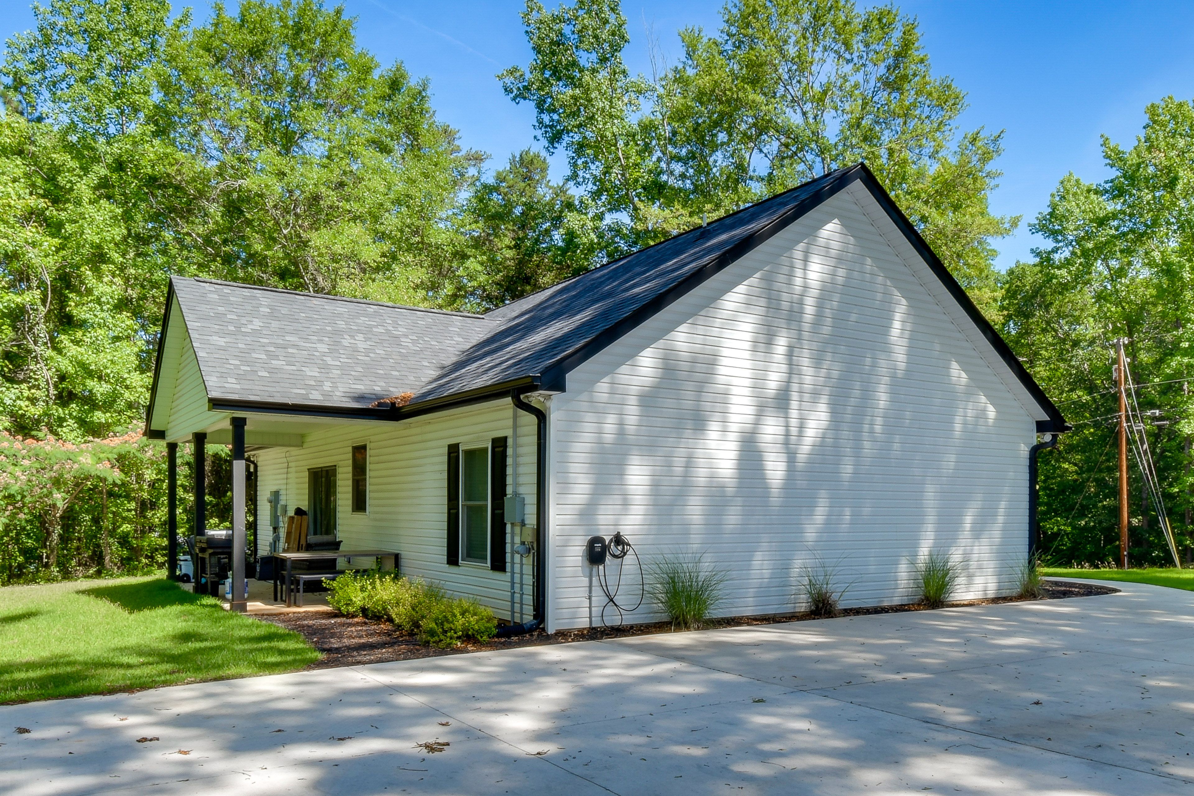 2 Driveways (5 Vehicles) | Boat/Trailer/RV Parking Available | EV Charger