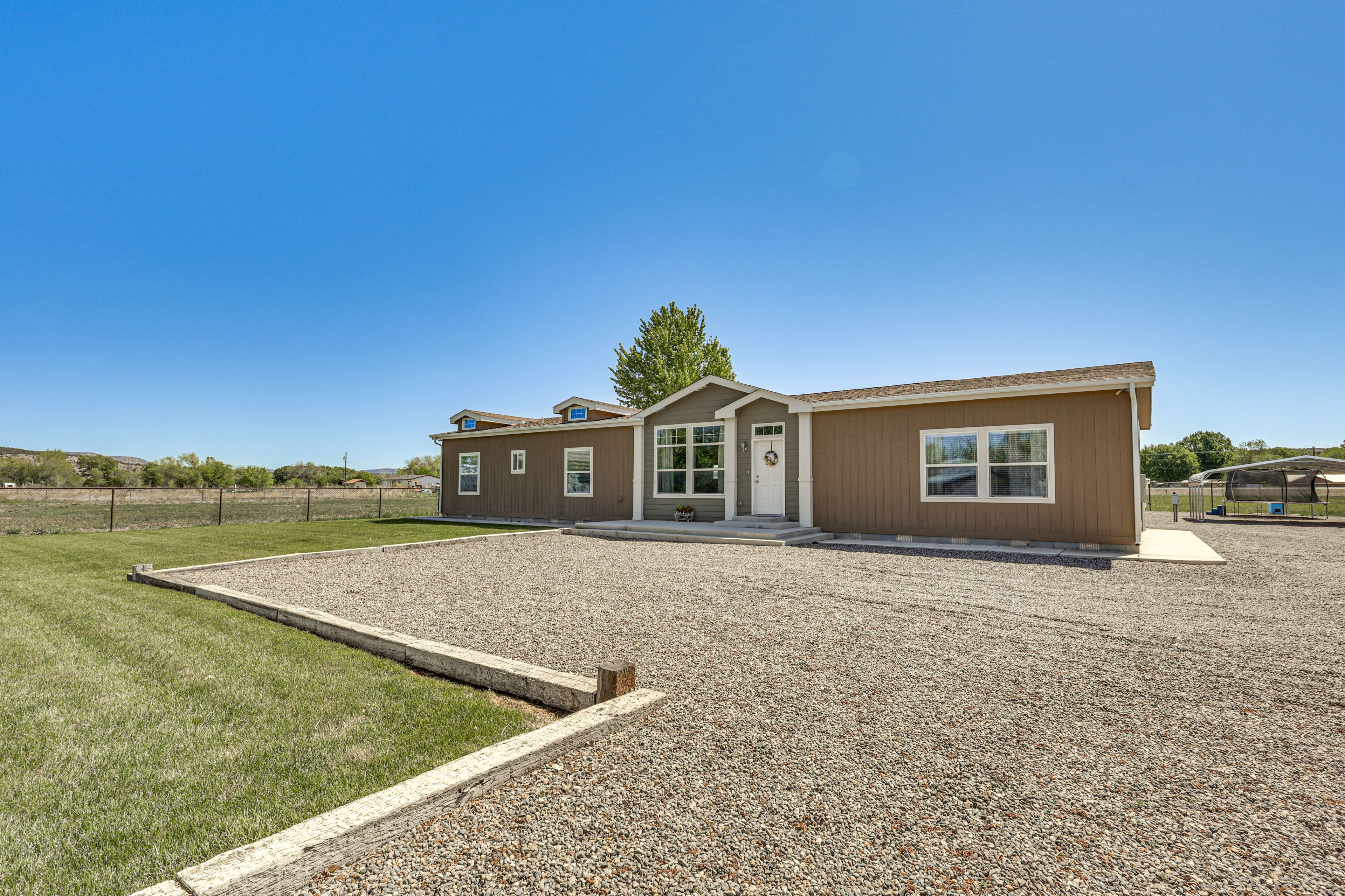 Home Exterior | Ample Driveway Parking | Electric Hookup On-Site