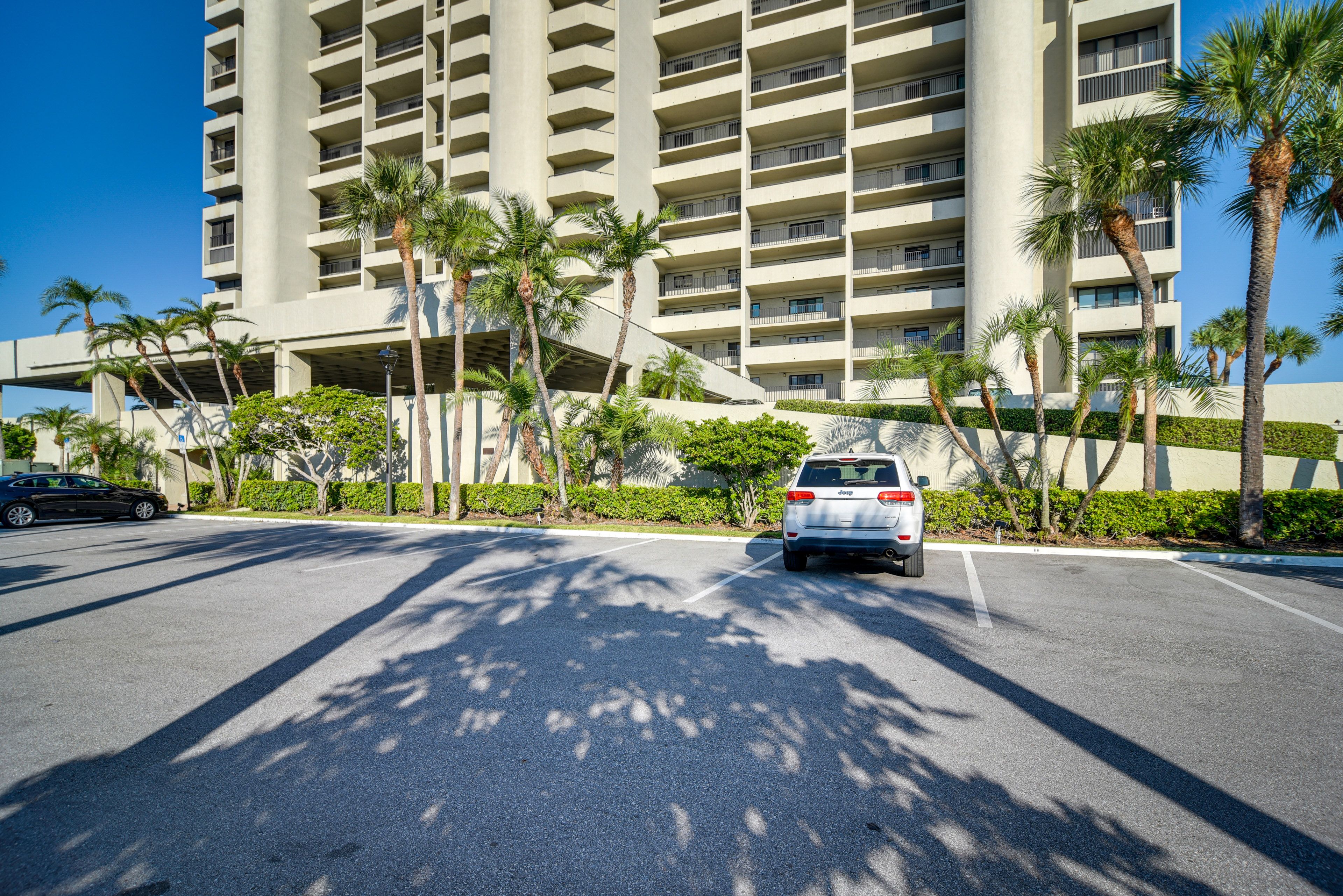 Condo Exterior | Covered Parking (1 Vehicle) | Additional Parking On-Site