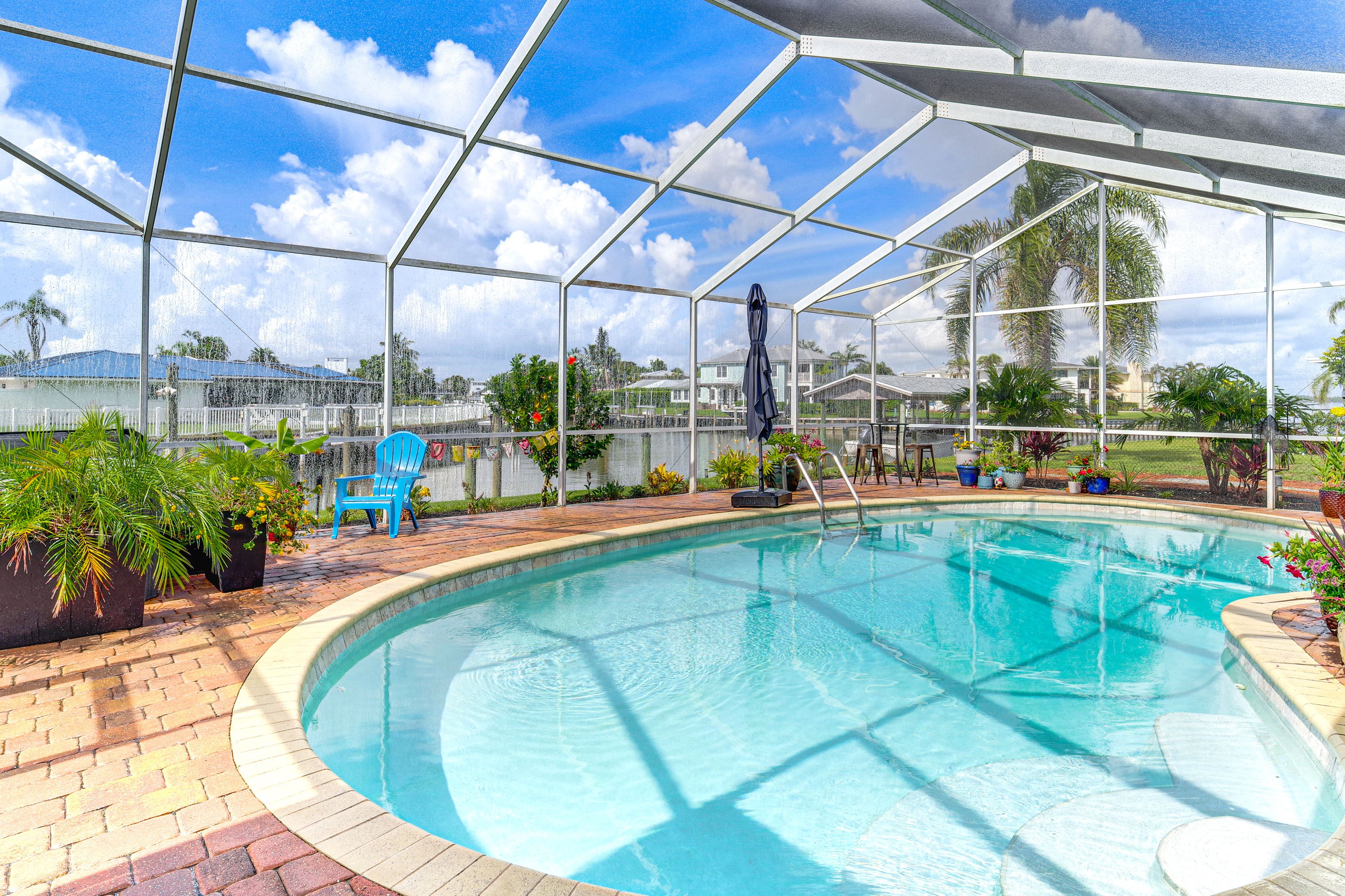 Apartment Exterior | Shared Pool & Hot Tub | River Views