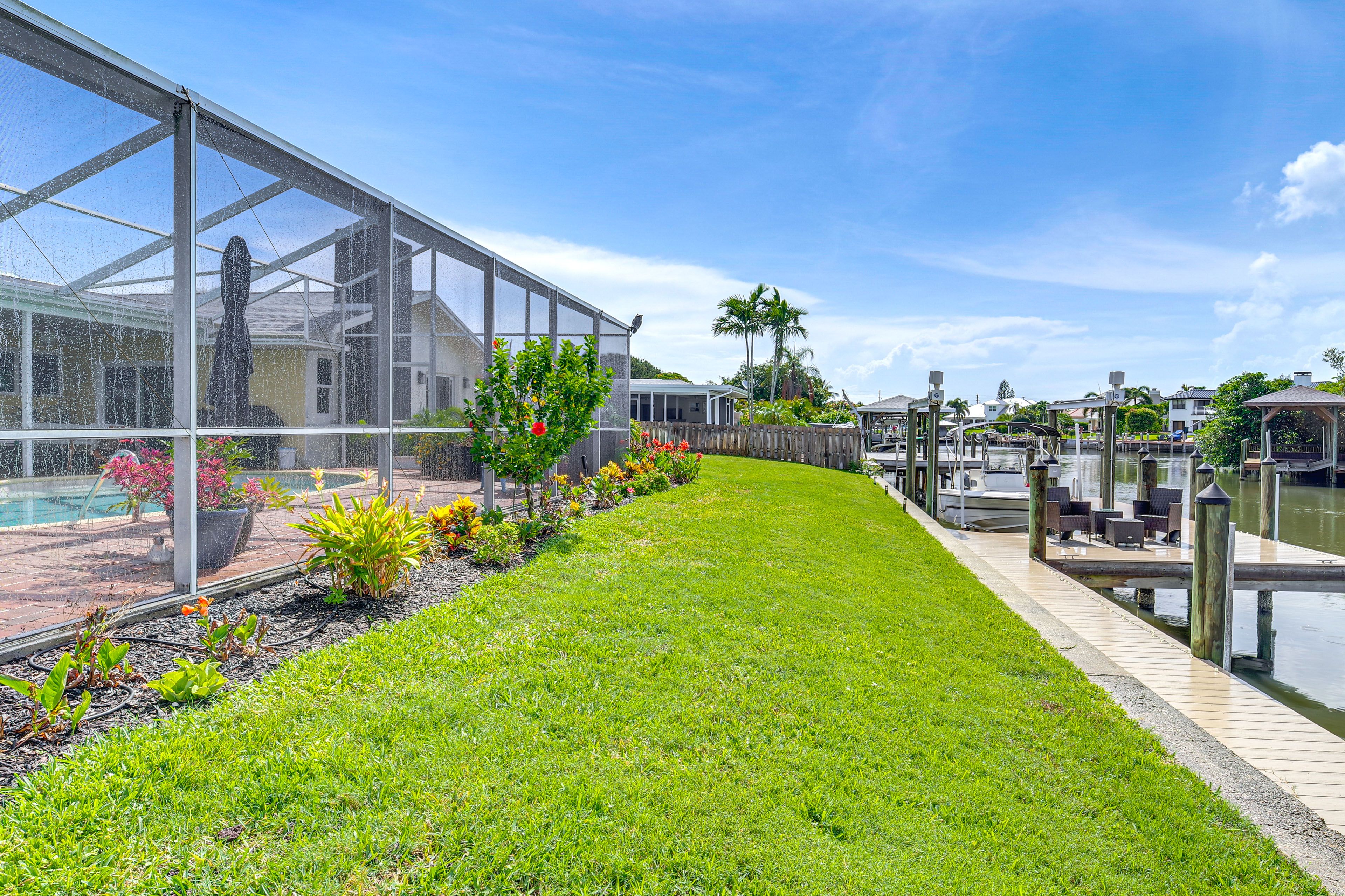 Apartment Exterior | Boat Dock w/ Seating | River Views & Access