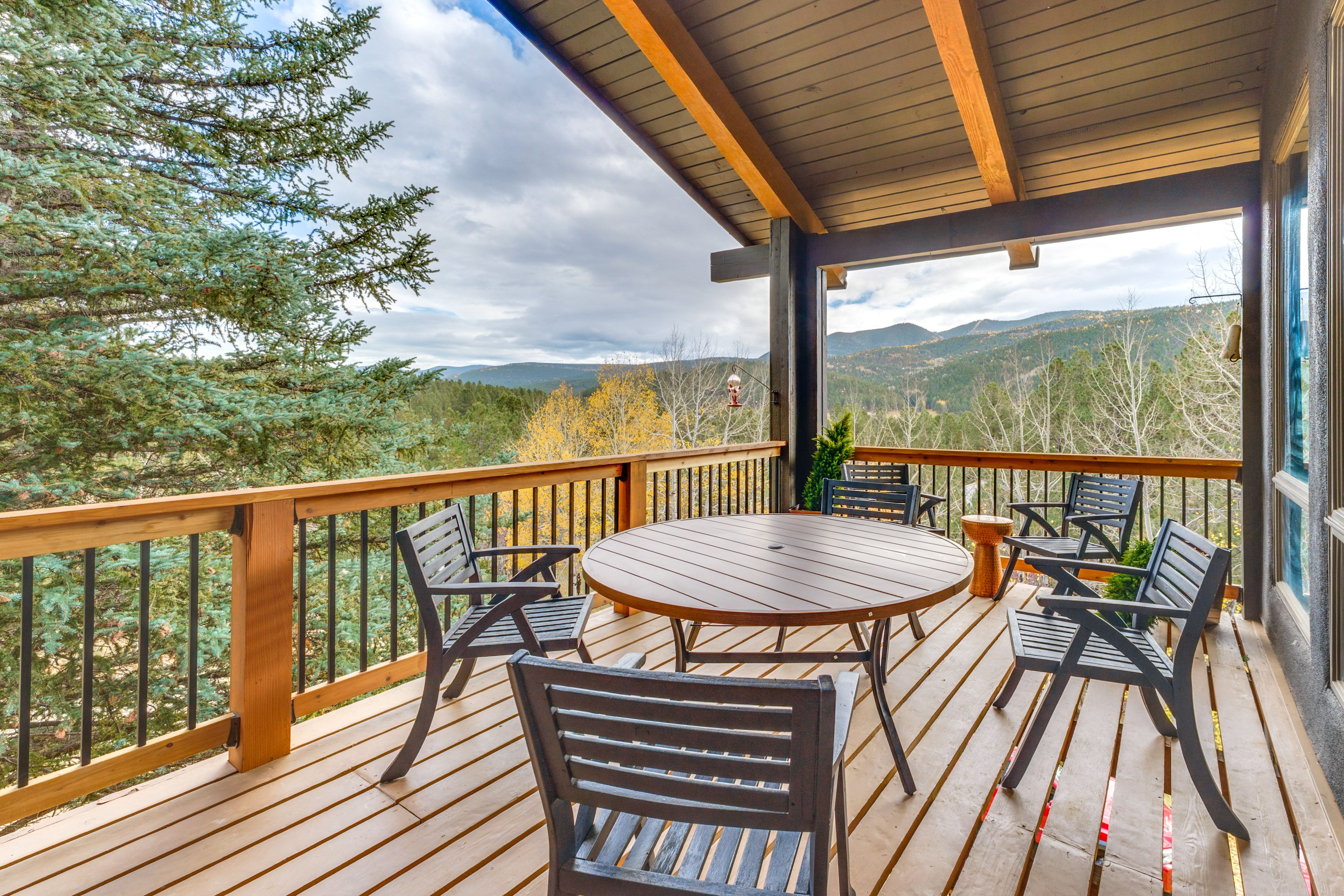 House Exterior | Furnished Deck w/ Dining Area | Gas Grill | Mountain Views