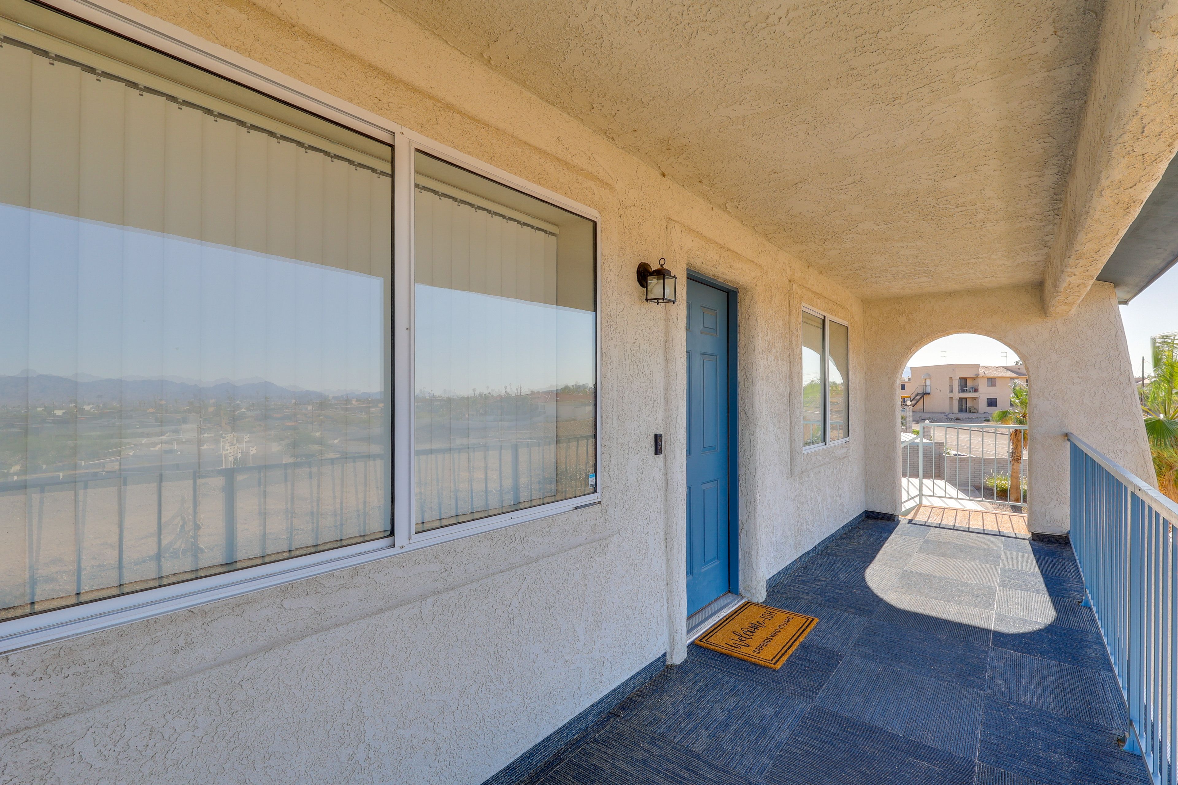Property Entrance | 2nd-Floor Unit | Single-Story Condo