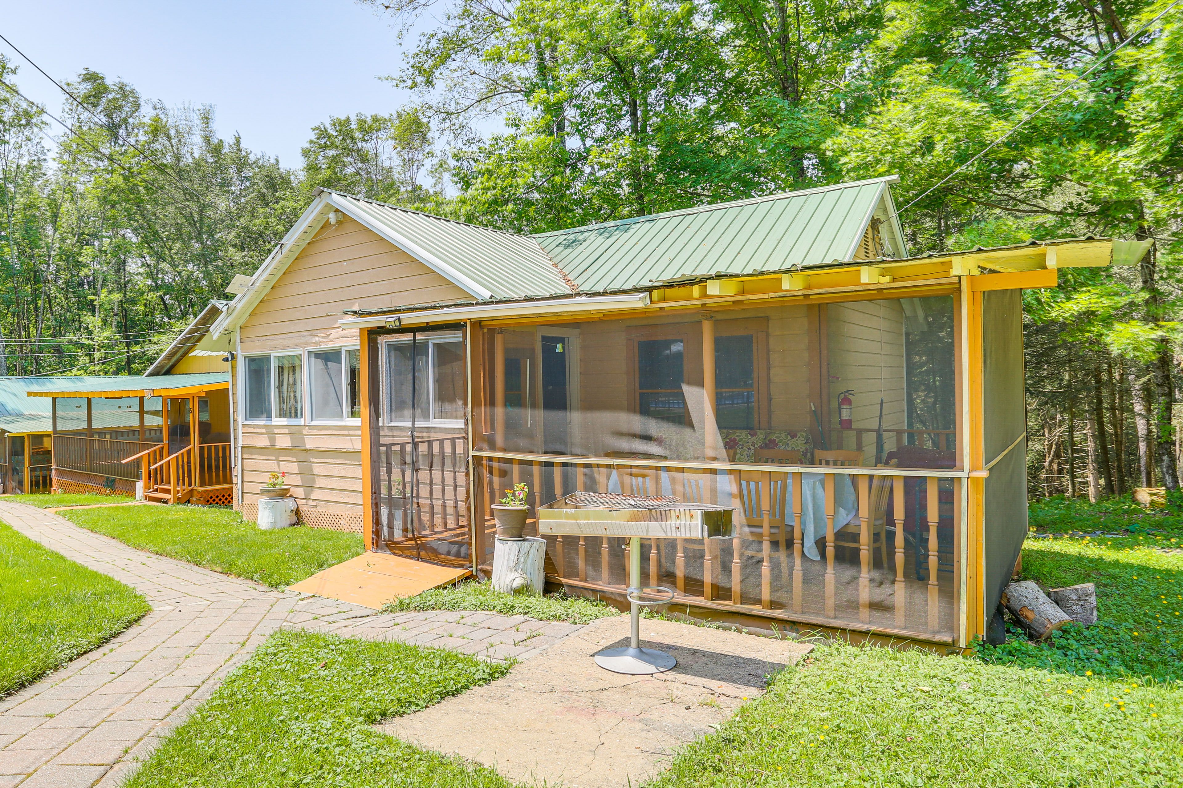 Property Exterior | Single-Story Cabin | Charcoal Grill
