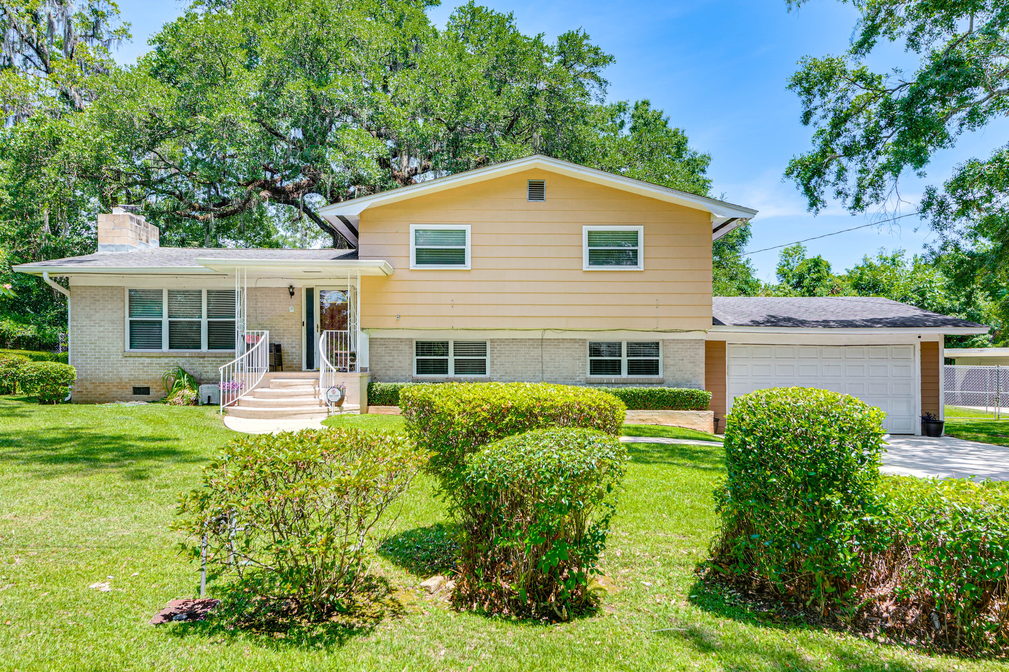 Property Exterior | Multi-Level Home | Spacious Yard