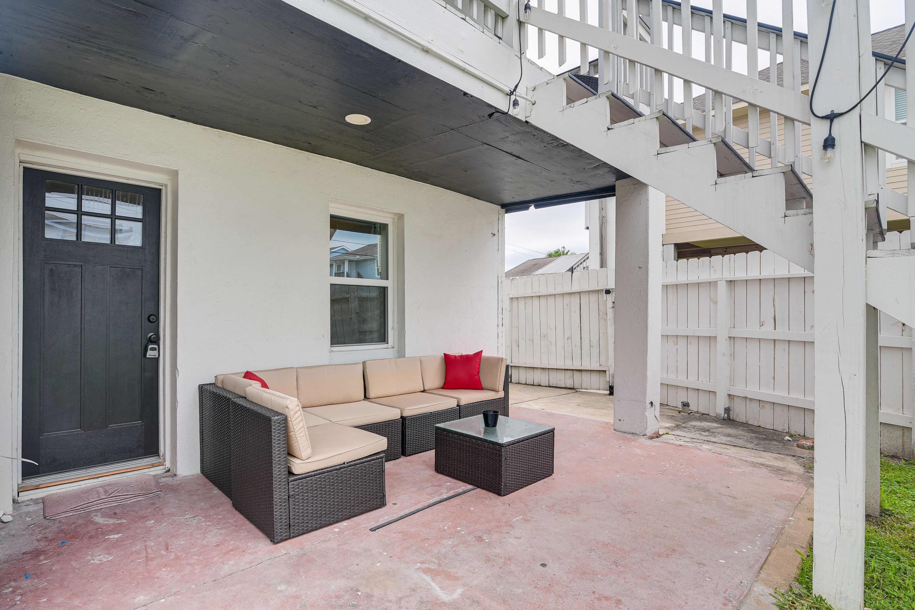 Patio | Fenced Backyard | 4 Mi to the Strand Historic District