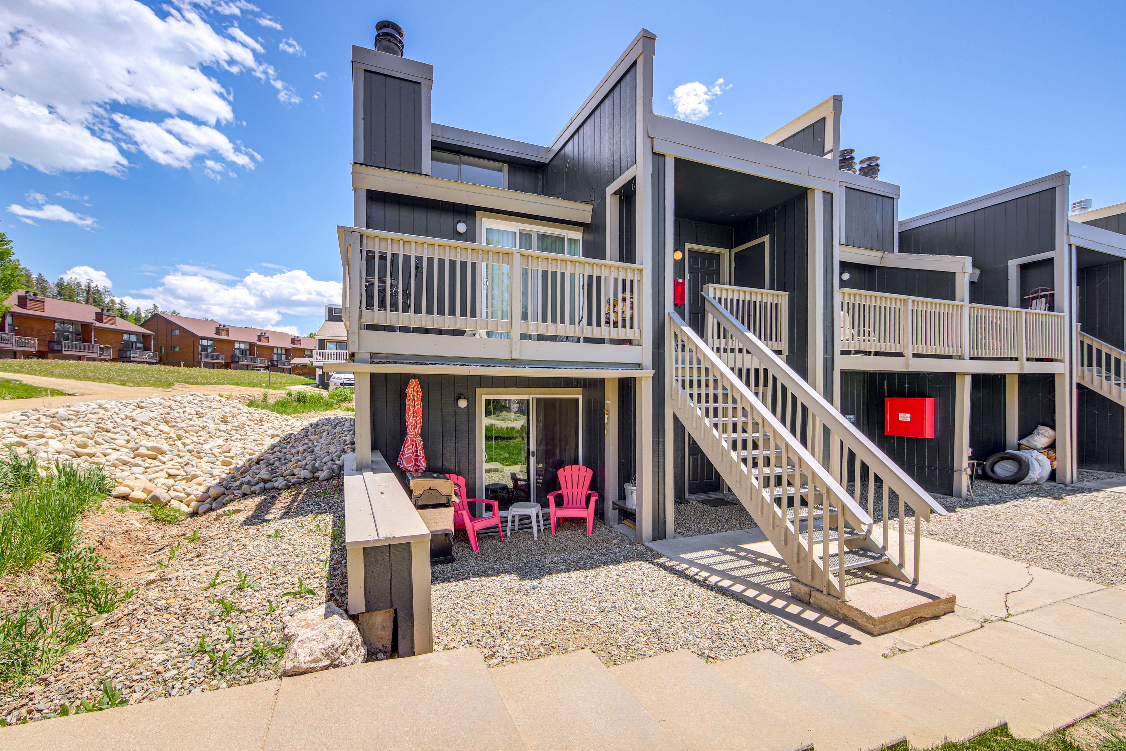 Property Exterior | Private Patio w/ Seating | Gas Grill