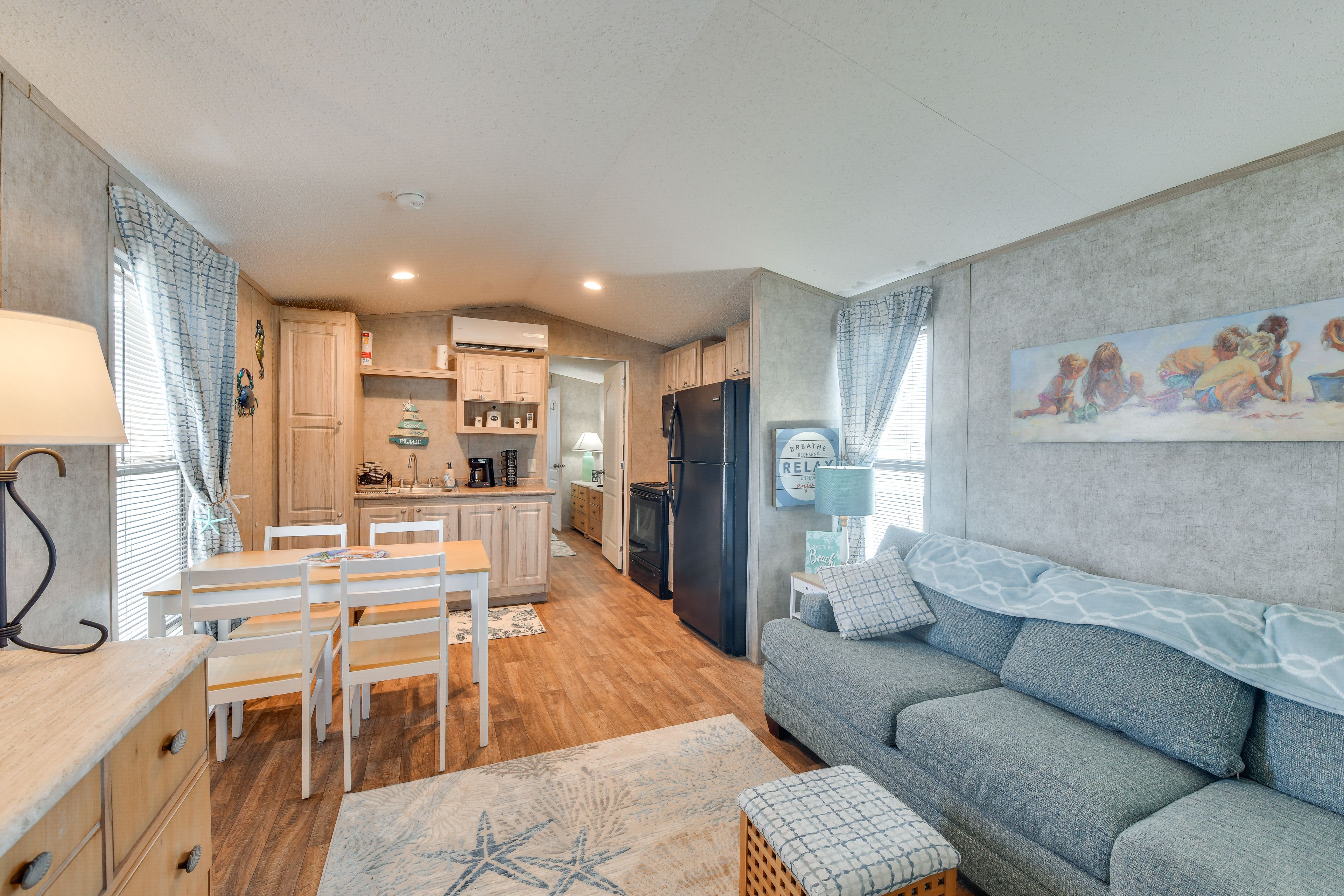 Living Room | Single-Story Stilted Home | Queen Sleeper Sofa | Smart TV