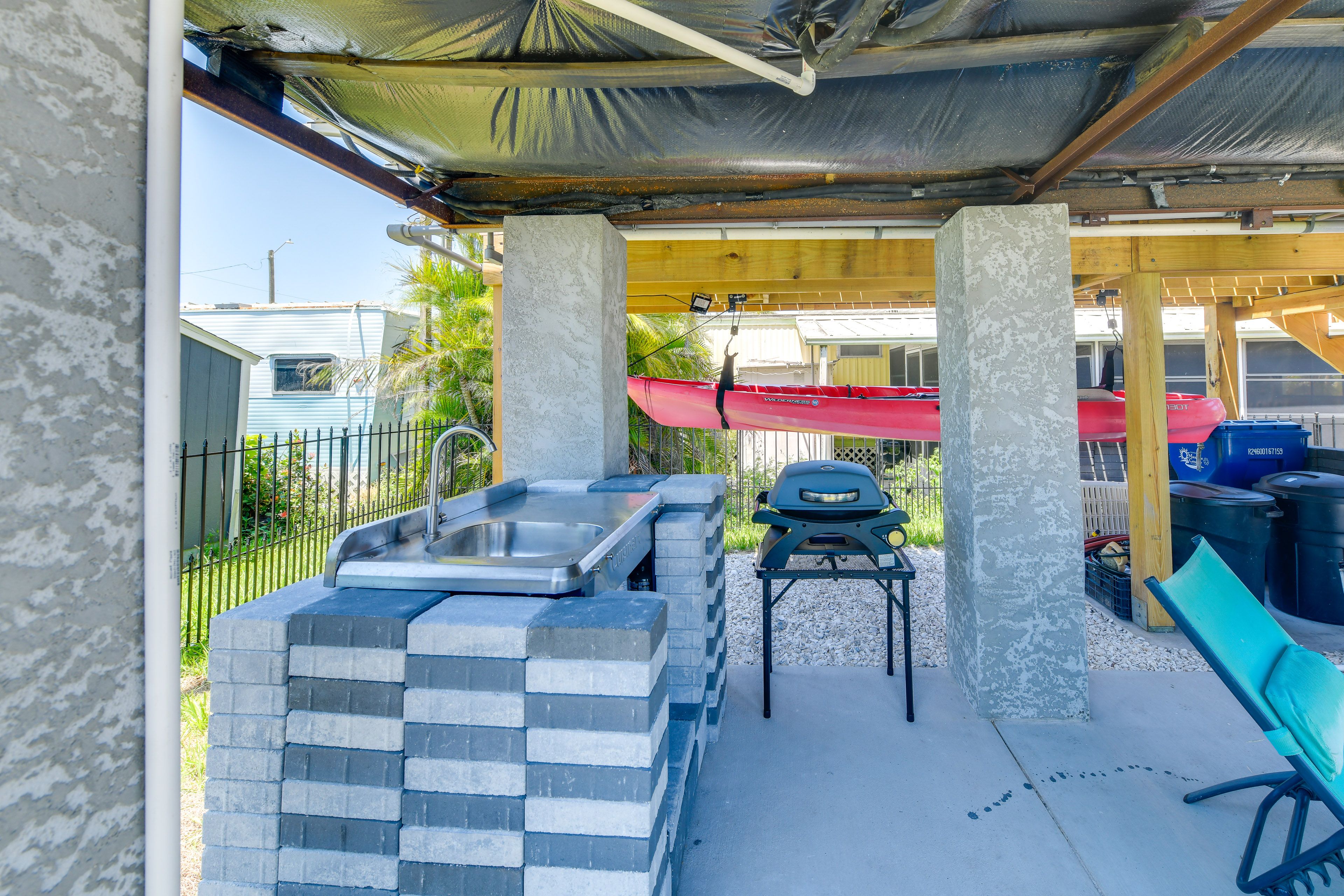 Patio | Outdoor Kitchen | Gas Grill | Kayak | Seating | Fire Pit