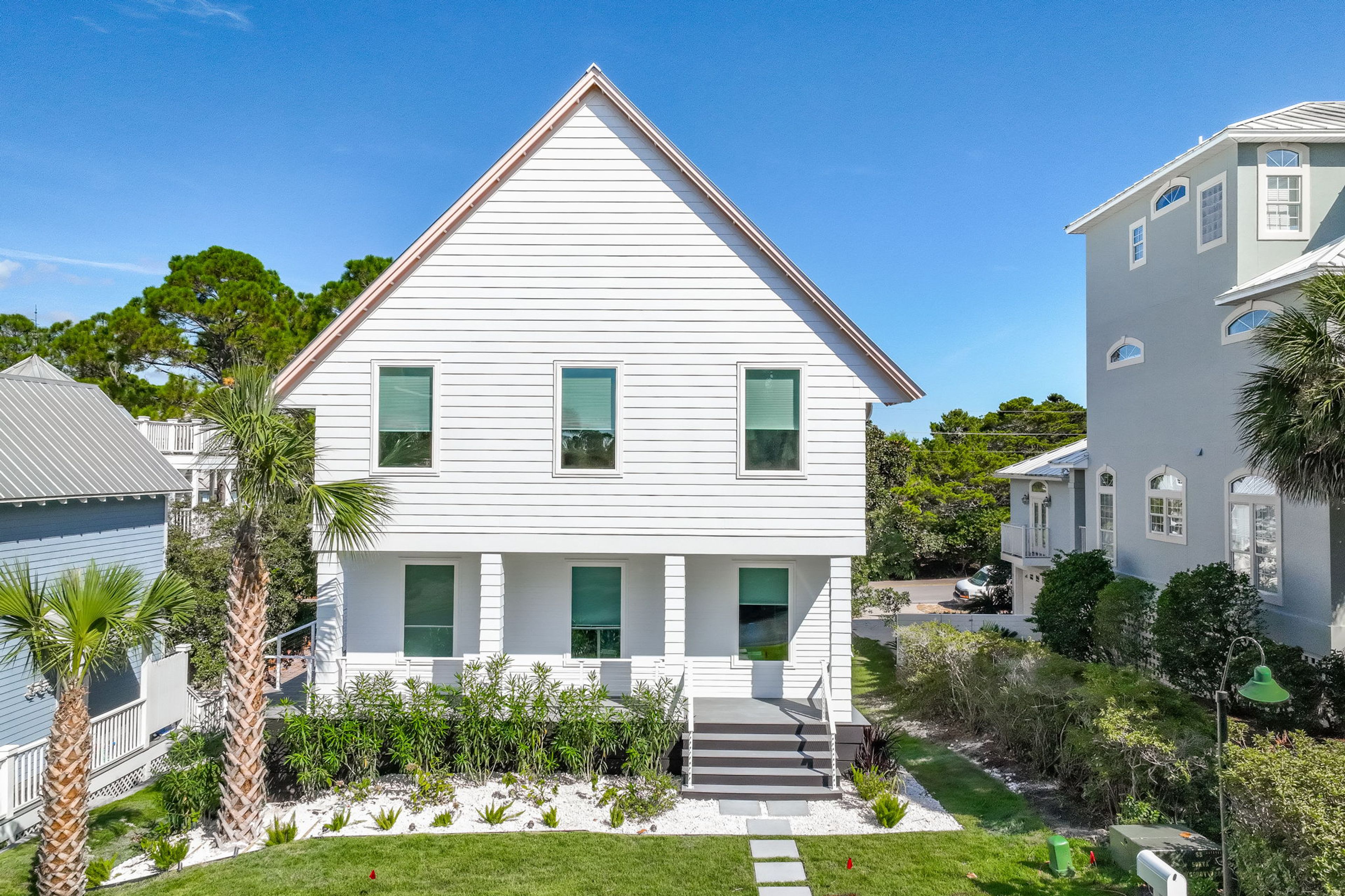Duplex Exterior | Covered Deck | Covered Balcony | Charcoal Grills