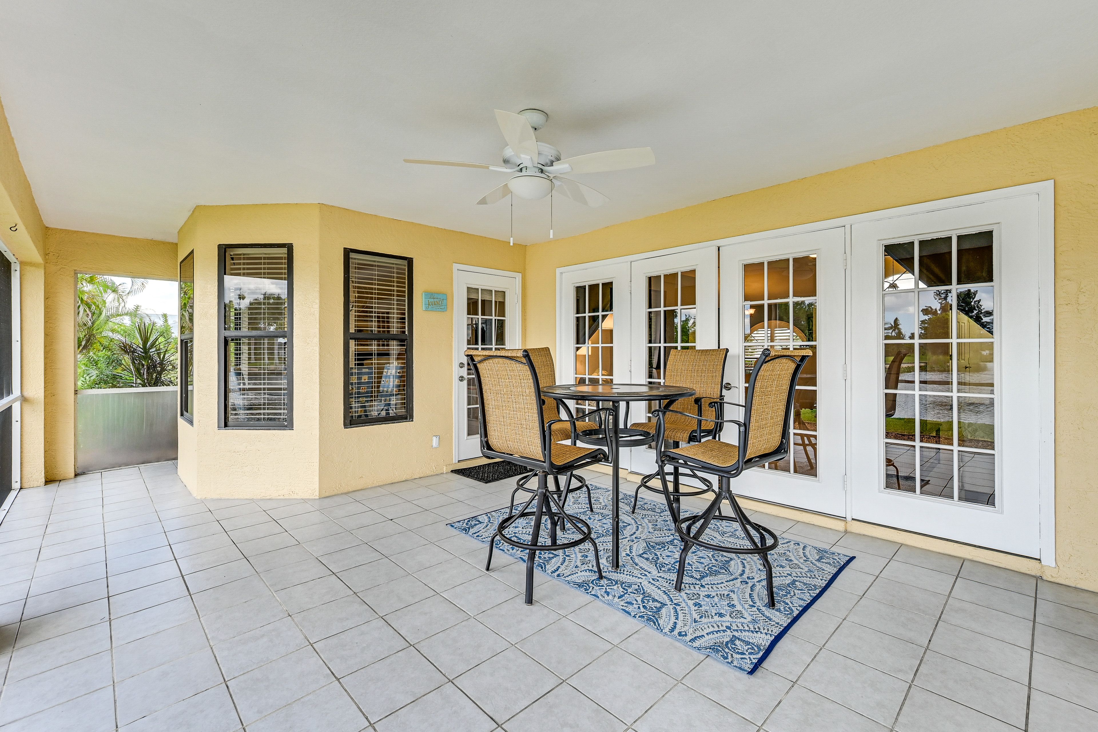 Property Exterior | Screened-In Lanai | Gas Grill