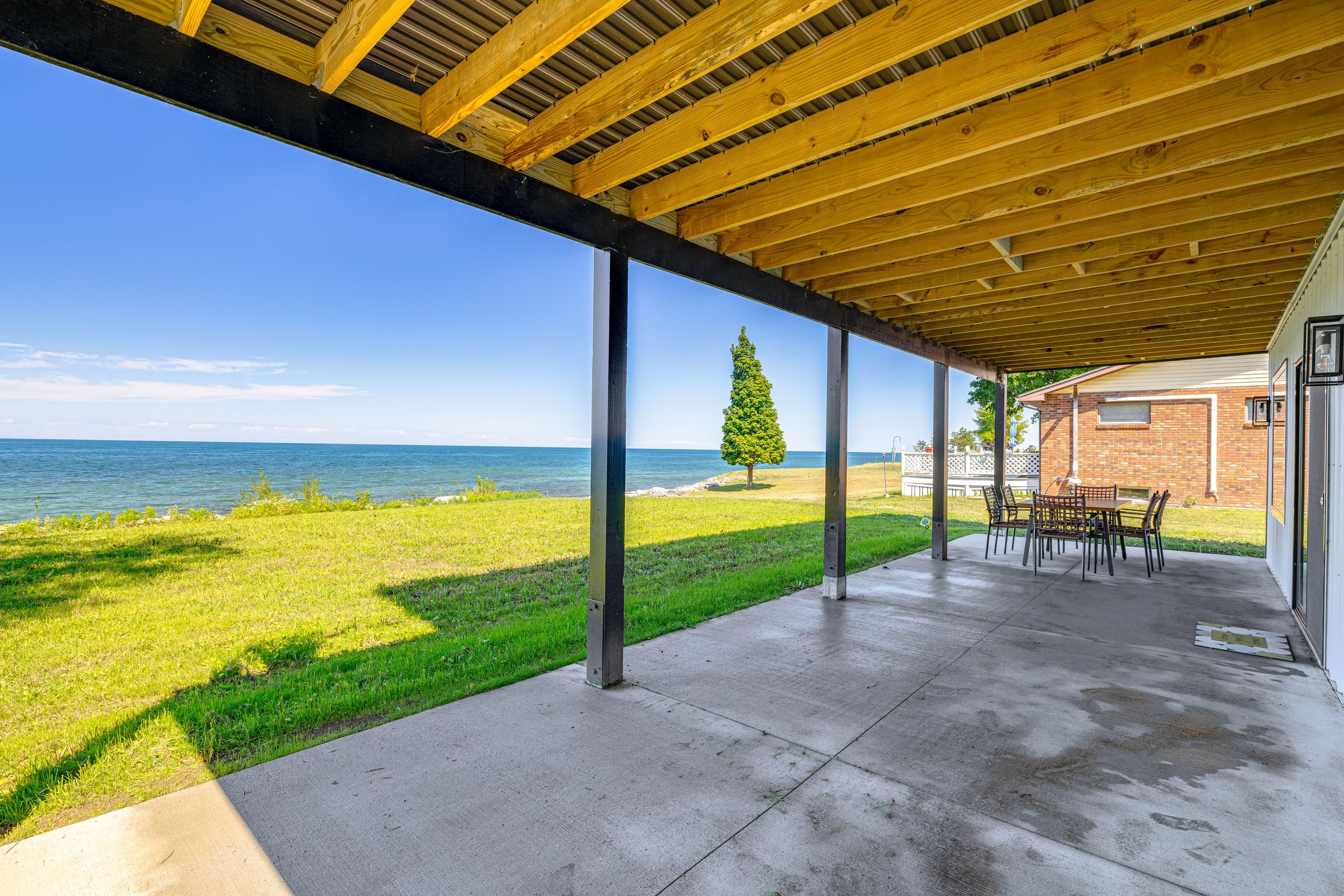 Covered Patio | Dining Area | Lake View