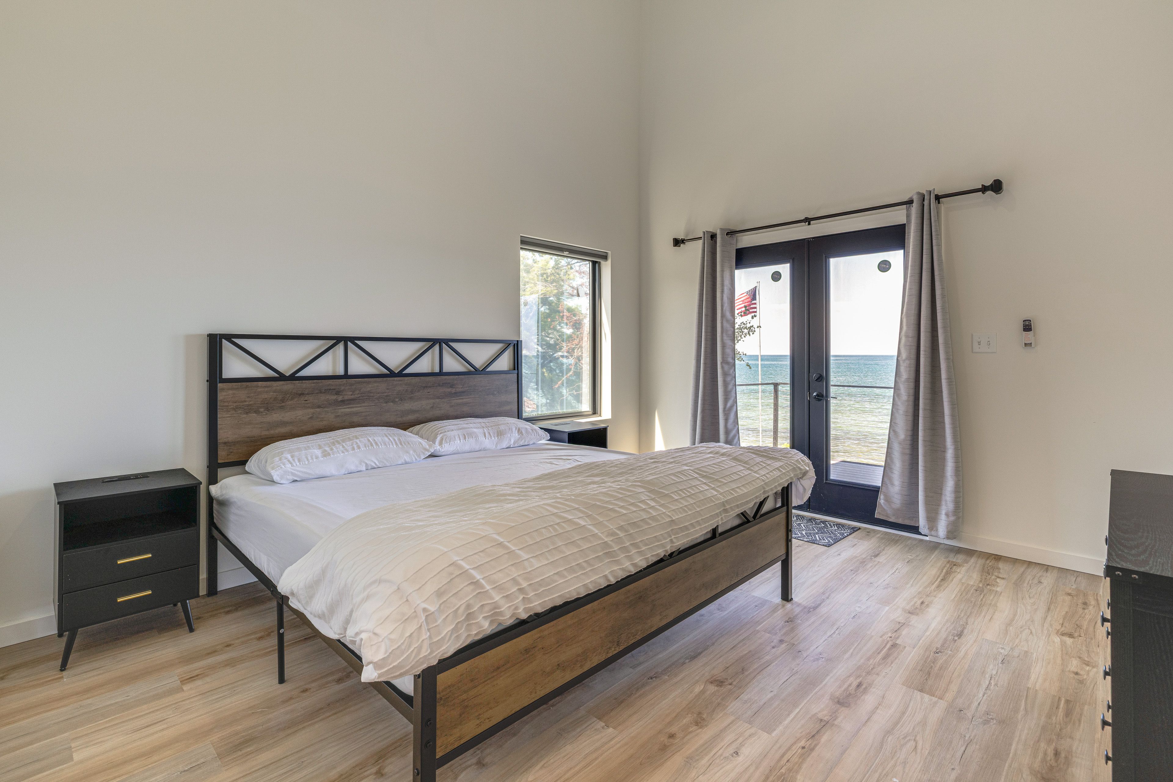 Bedroom 1 | 2nd Floor | King Bed | Linens Provided | Lake View | Deck Access