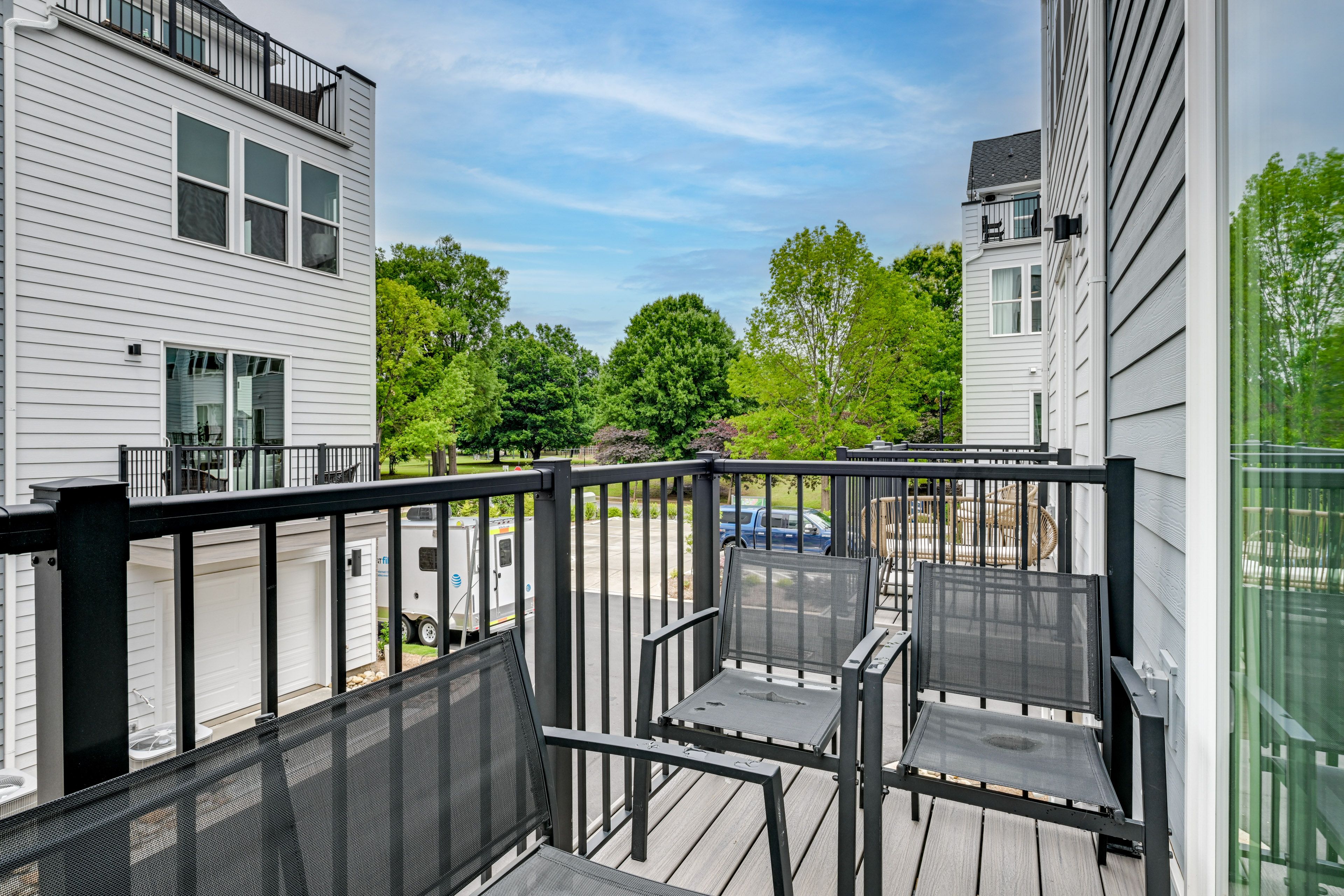 Townhome Exterior | Balcony w/ Seating