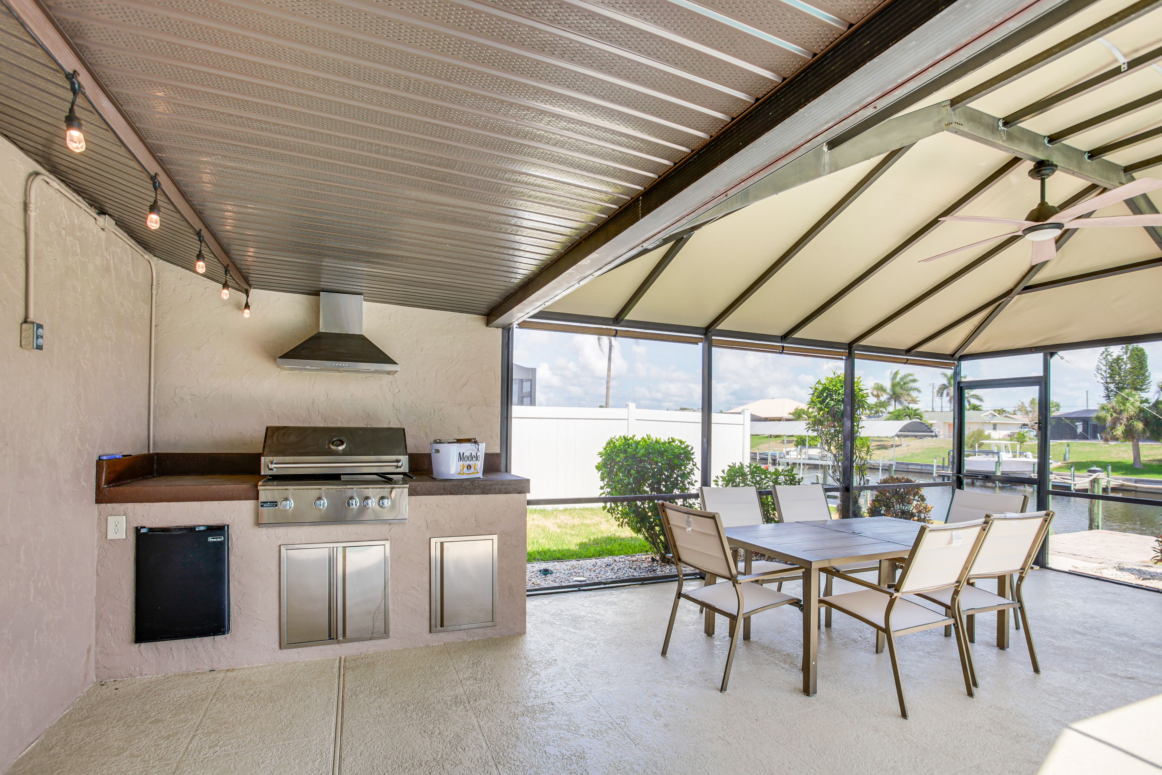 Screened-In Lanai | Grill | Dining Table | Lounging Furniture
